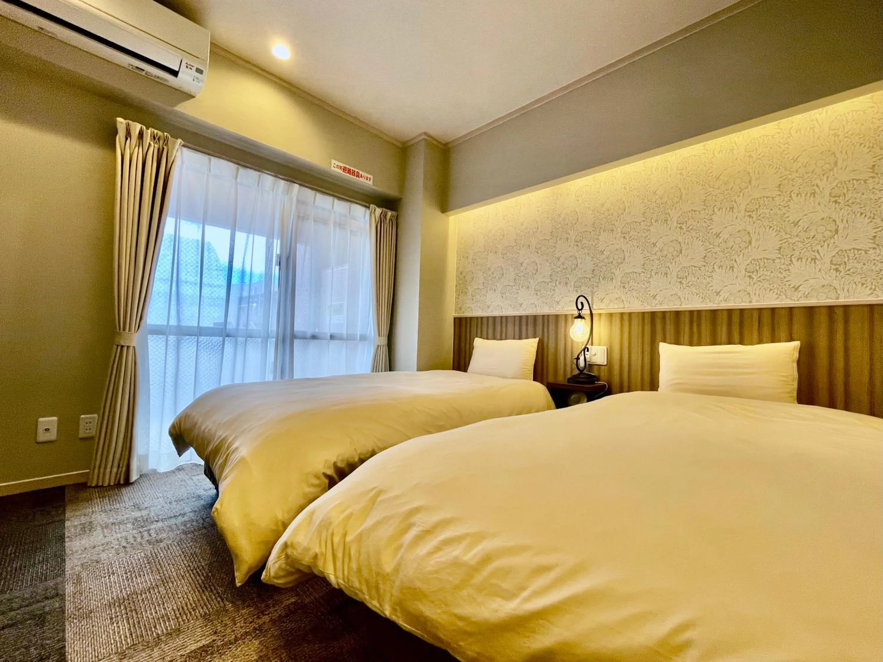 Bed in ホテル天使館 久茂地 -Tenshi-Kan-