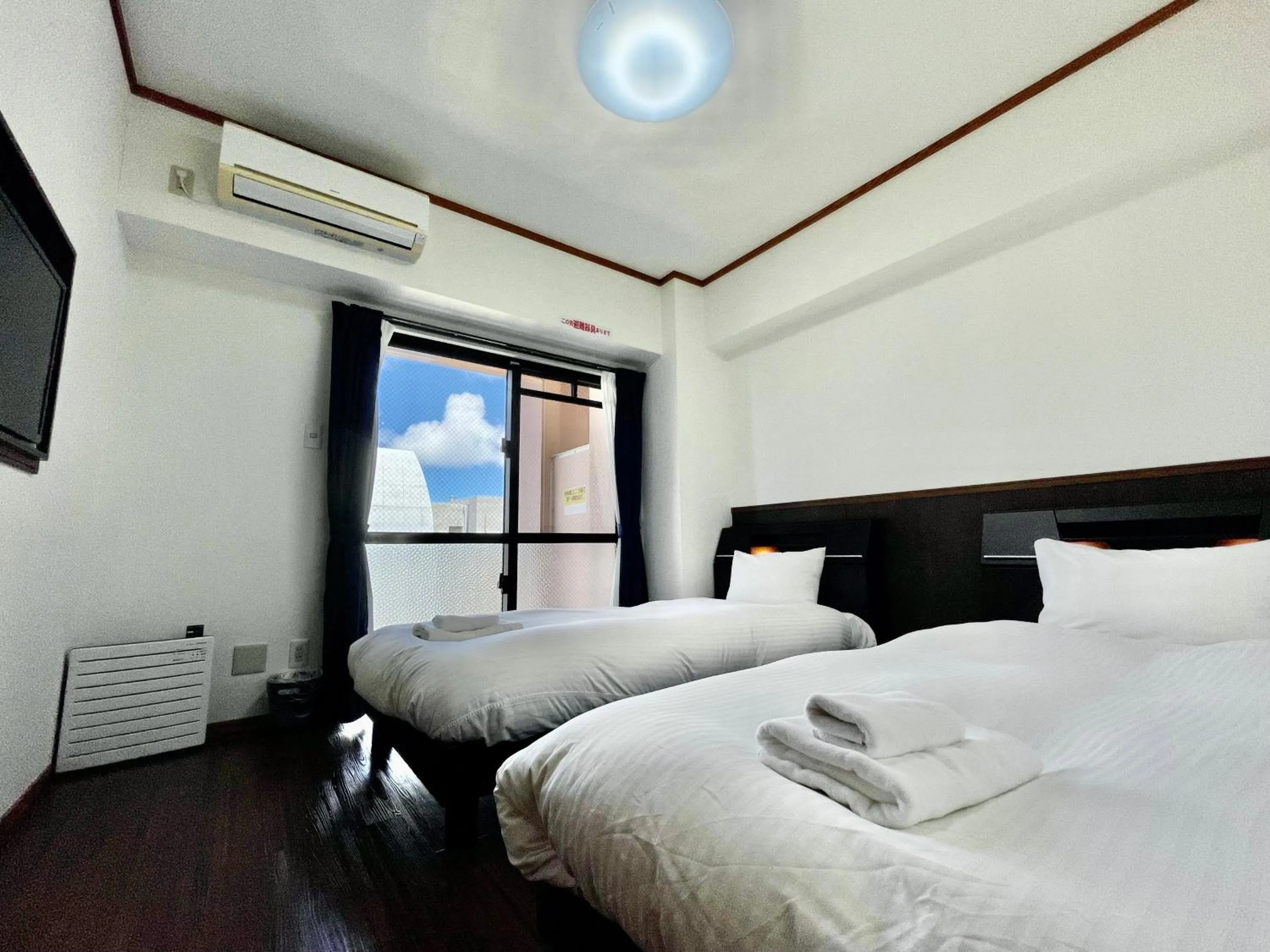 Bed in ホテル天使館 久茂地 -Tenshi-Kan-