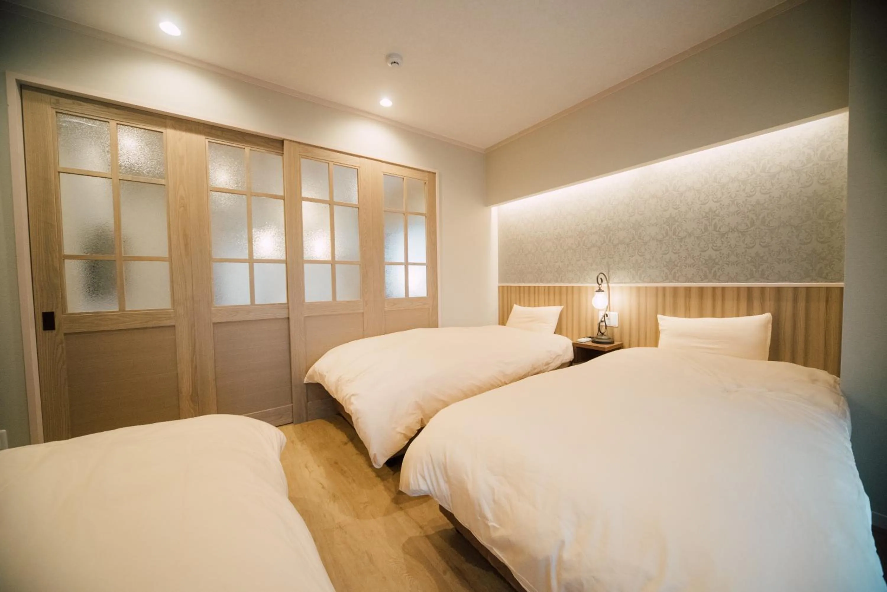 Bed in ホテル天使館 久茂地 -Tenshi-Kan-