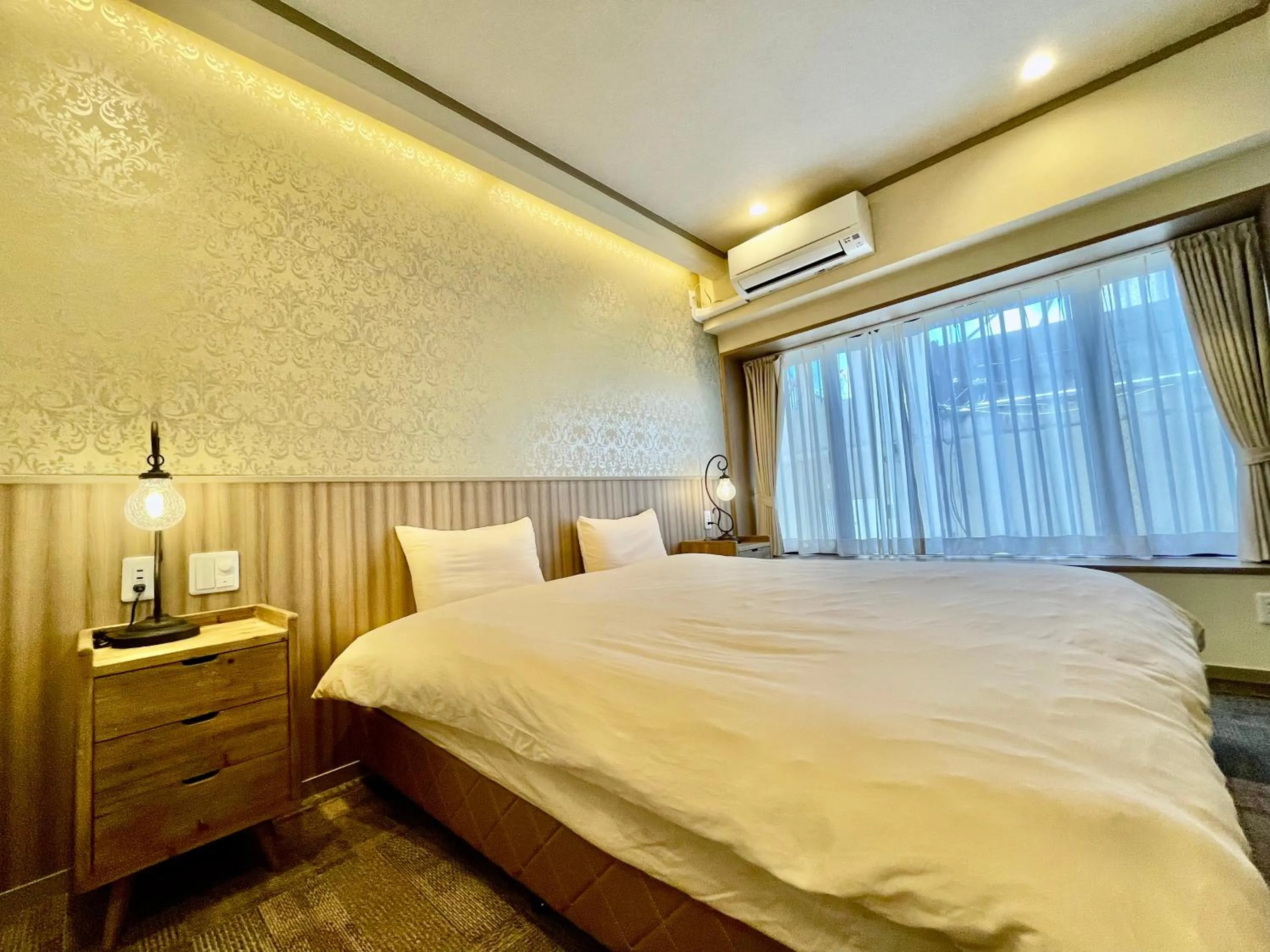 Bed in ホテル天使館 久茂地 -Tenshi-Kan-