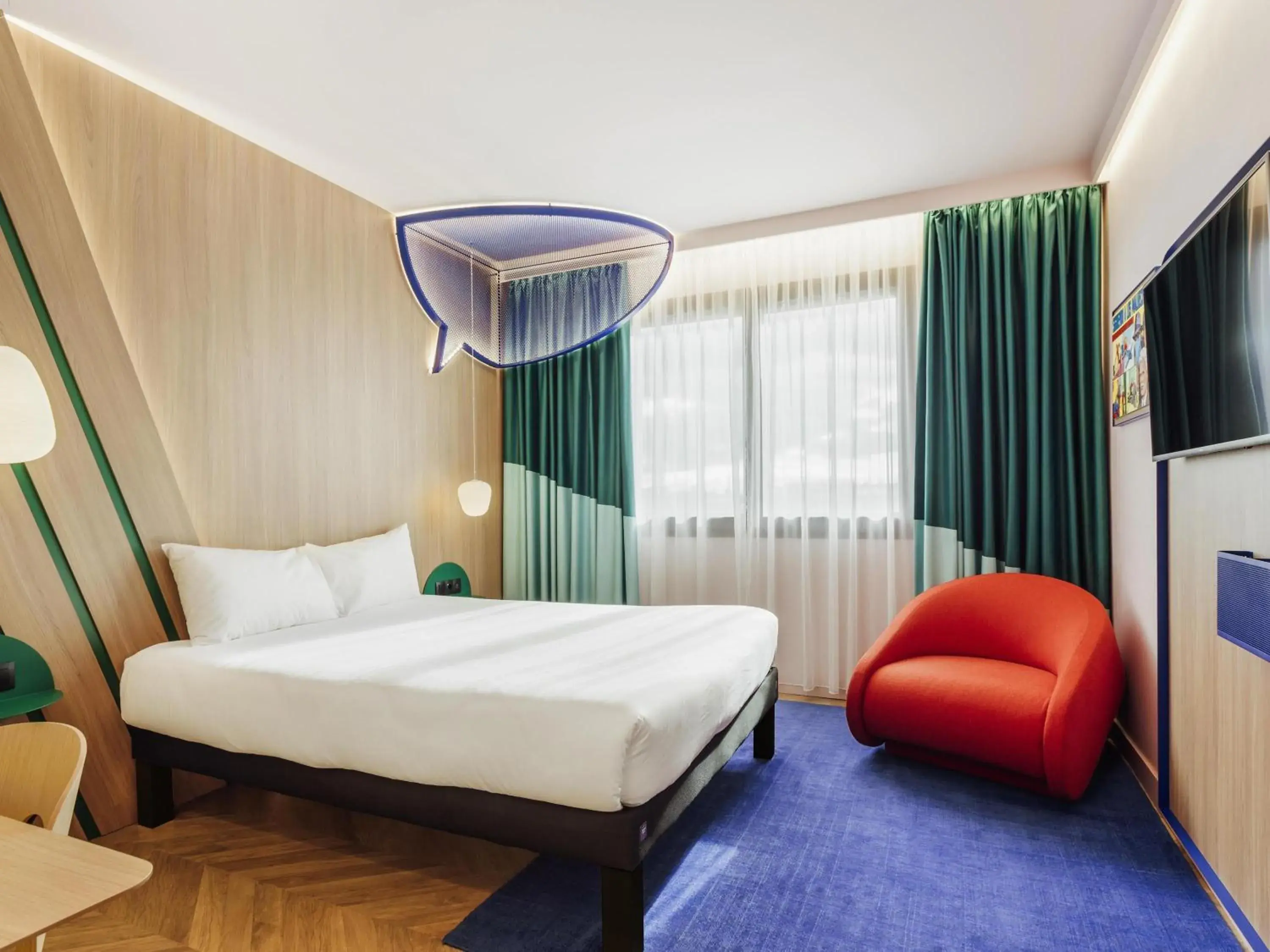 Superior Room with Queen Bed and Sofa in Ibis Styles Madrid City Las Ventas Superior Room with Queen Bed and Sofa in Ibis Styles Madrid City Las Ventas
