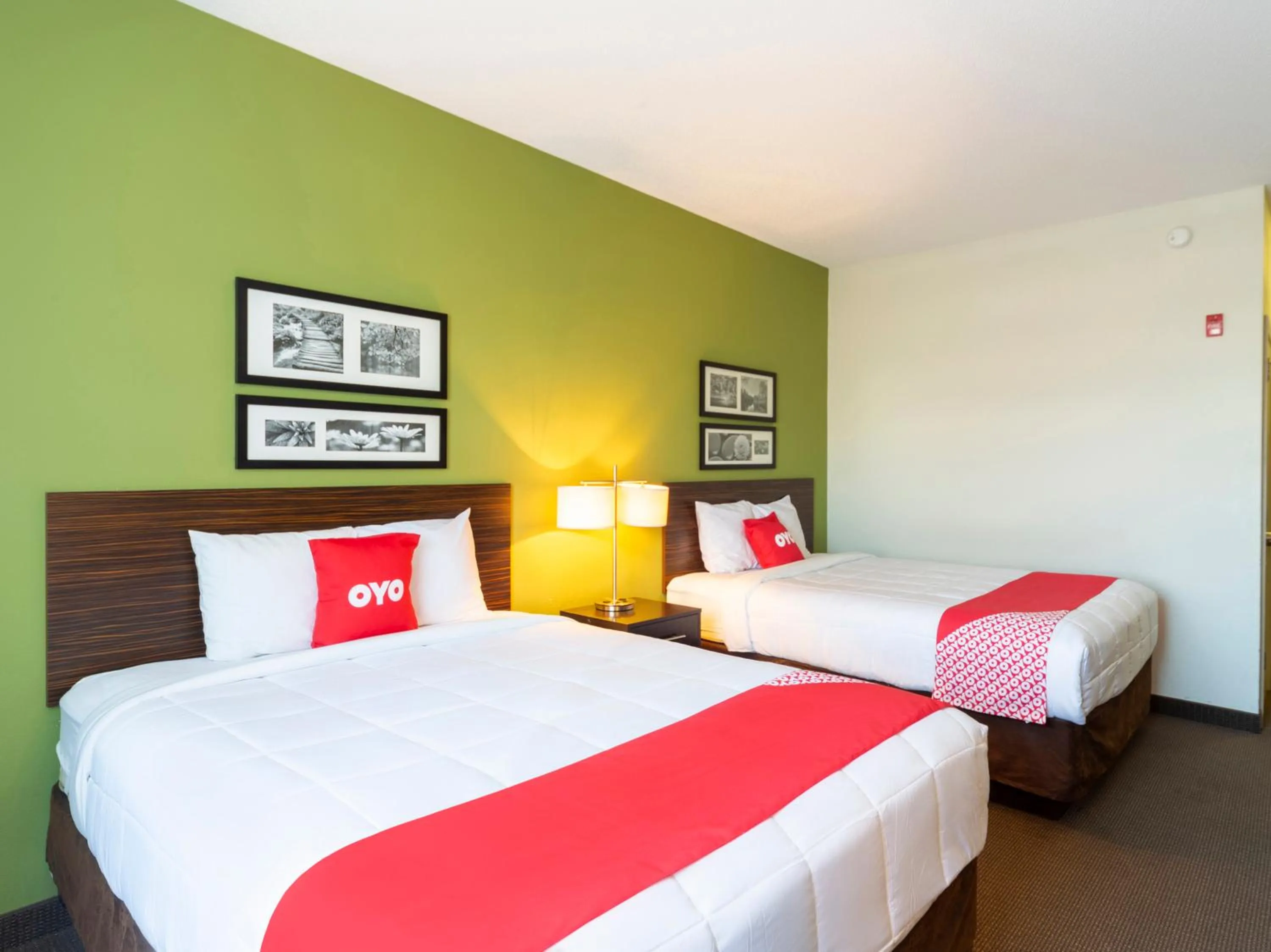 Bedroom in Ramada by Wyndham Jackson MS