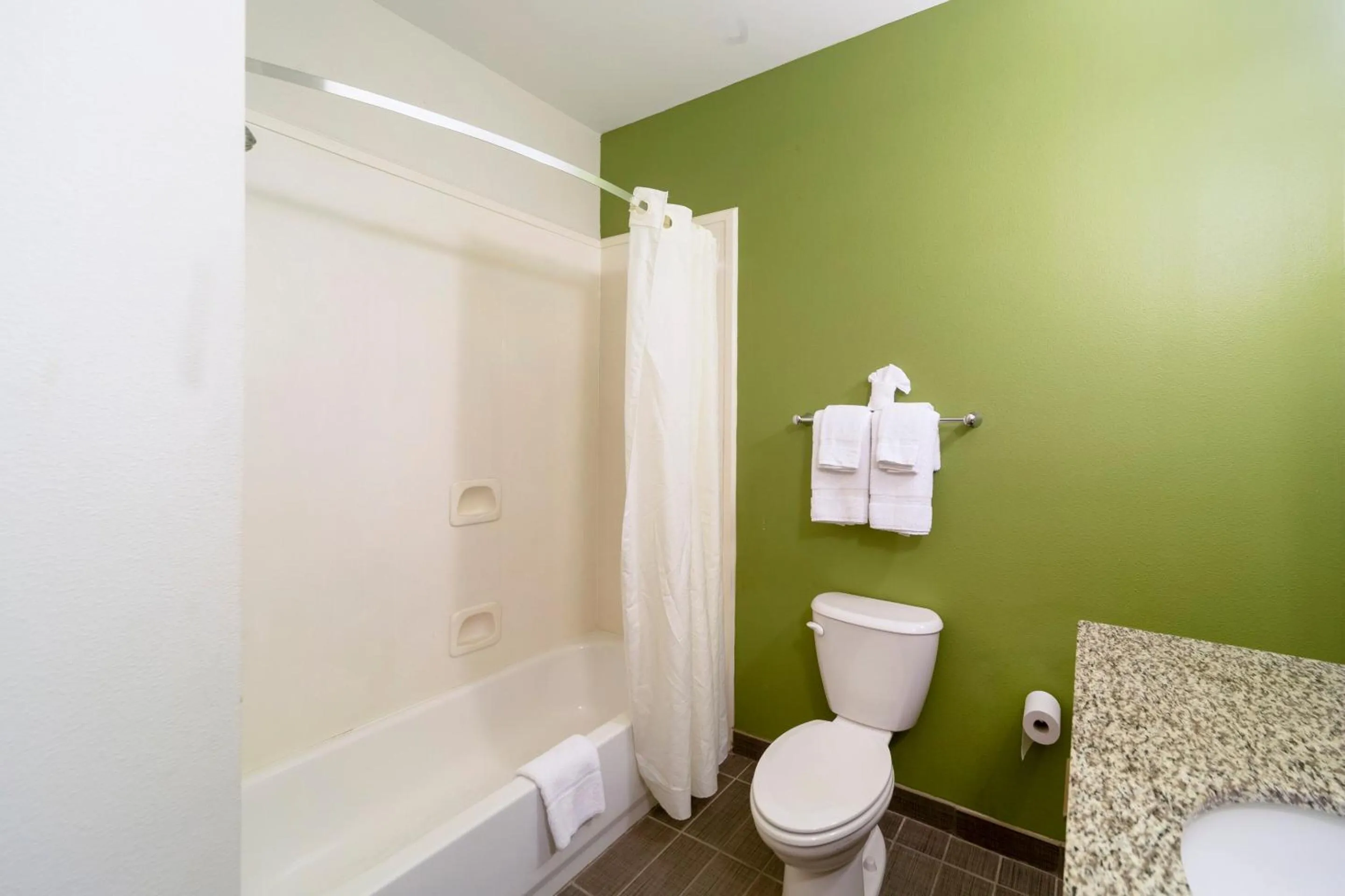 Bathroom in Ramada by Wyndham Jackson MS