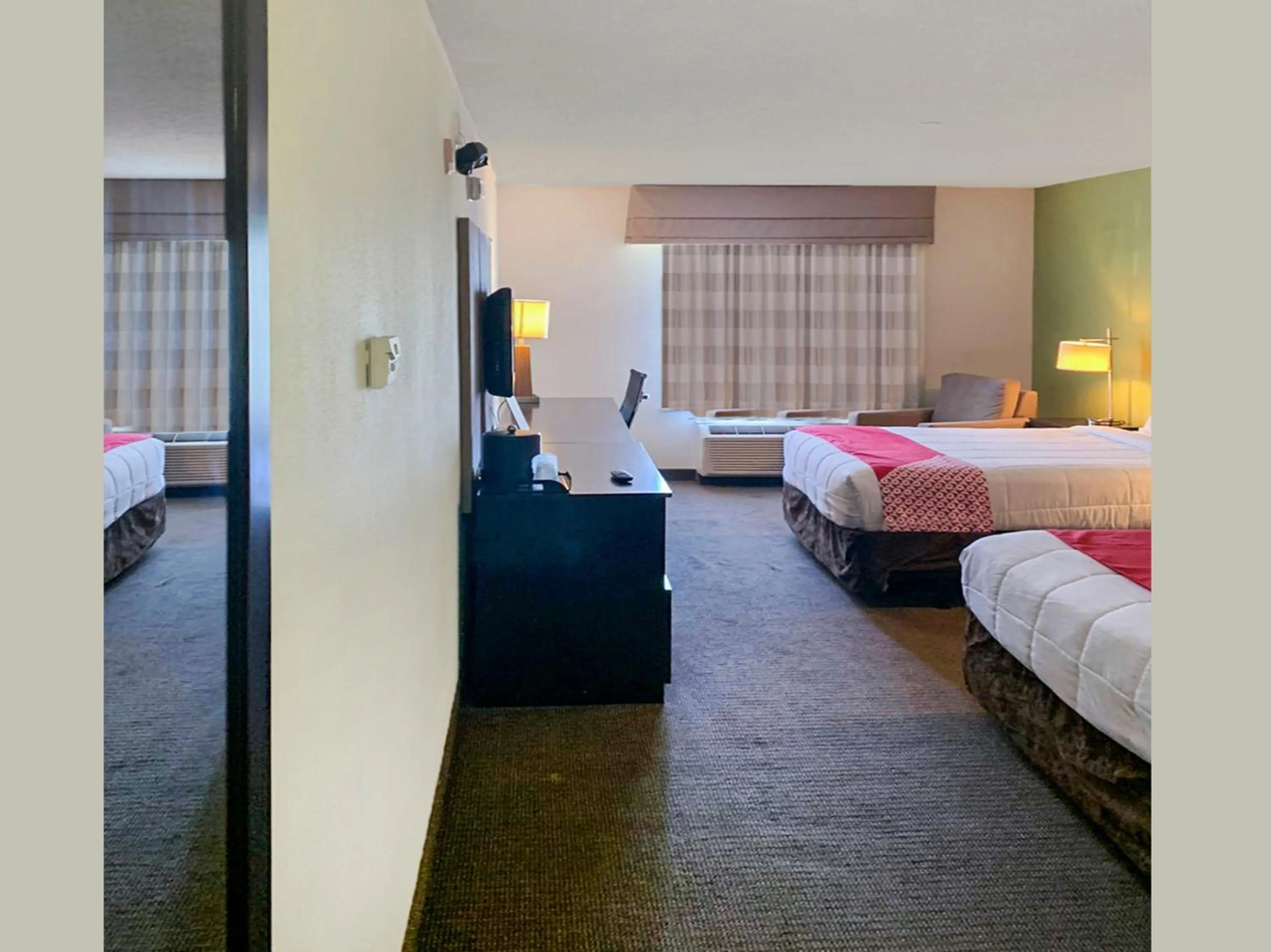 Bedroom in Ramada by Wyndham Jackson MS