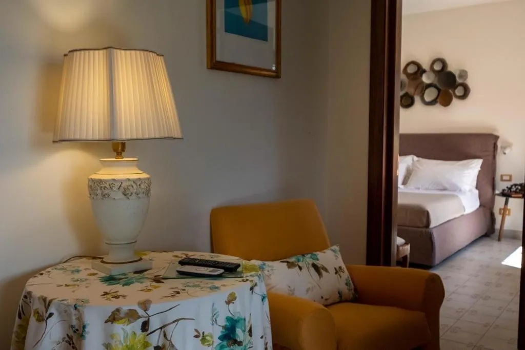 Living room, Bed in Tenuta DonnAnna Agriturismo&Glamping