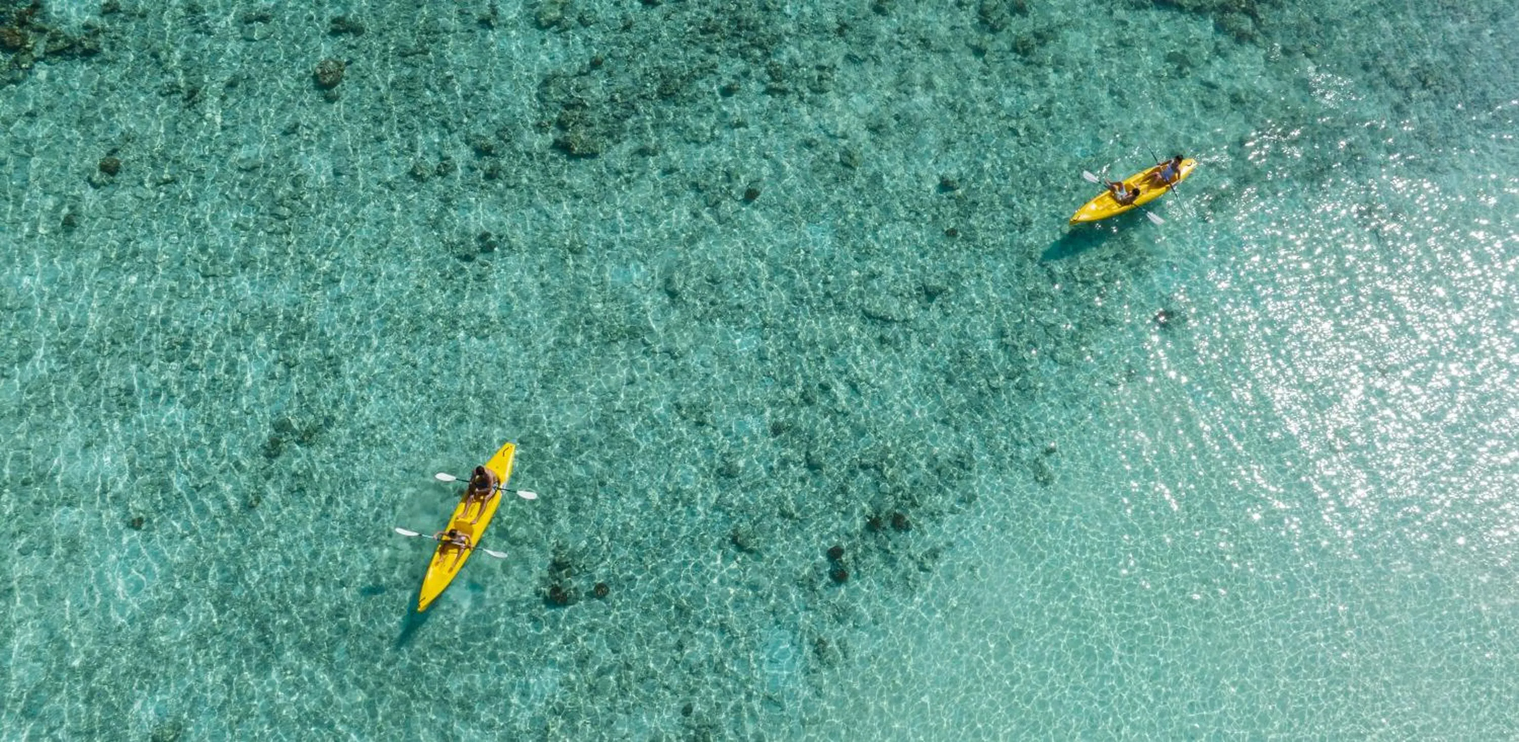 People in Intercontinental Maldives Maamunagau Resort with Club benefits by IHG