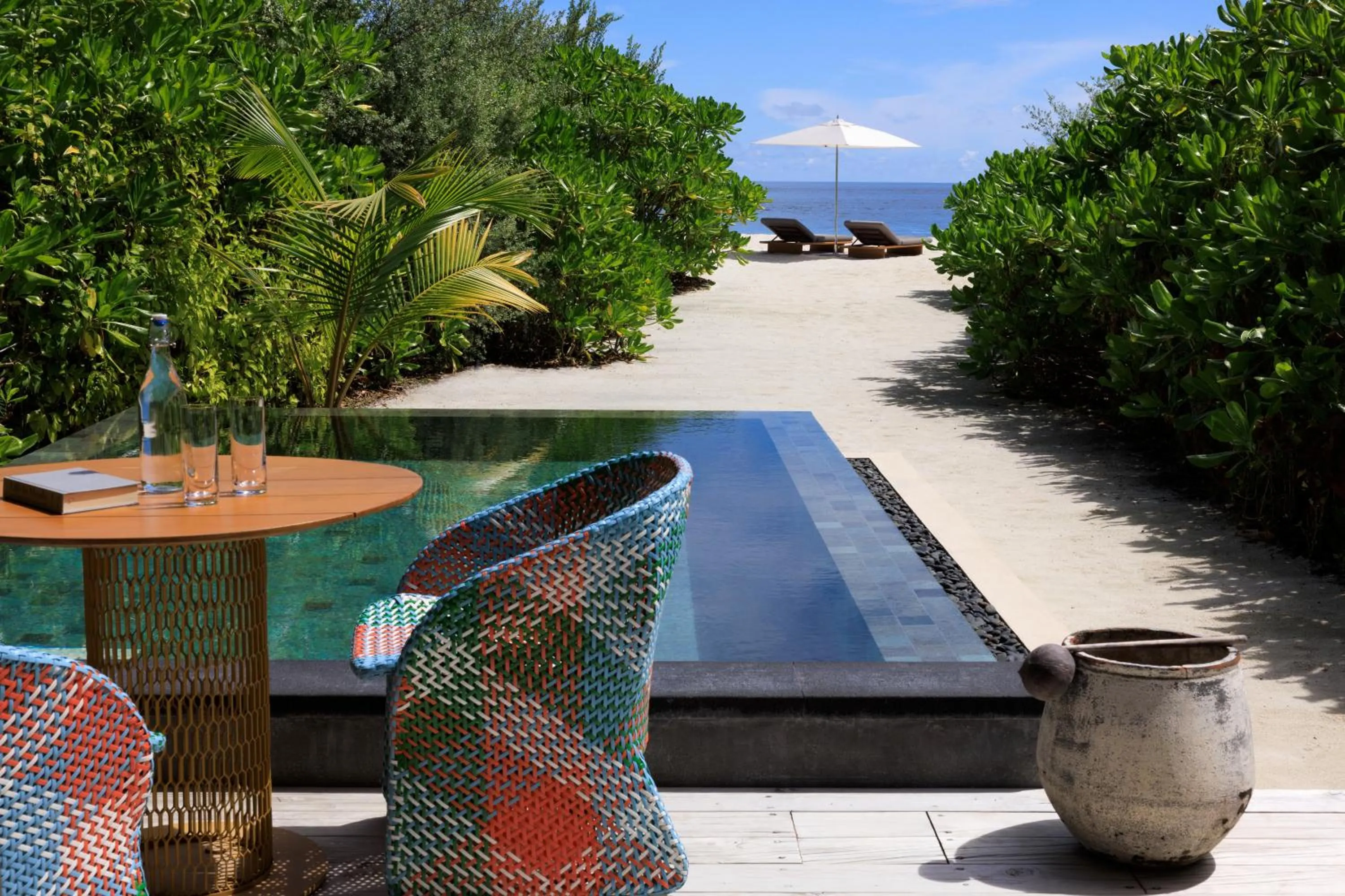 Swimming pool in Intercontinental Maldives Maamunagau Resort with Club benefits by IHG