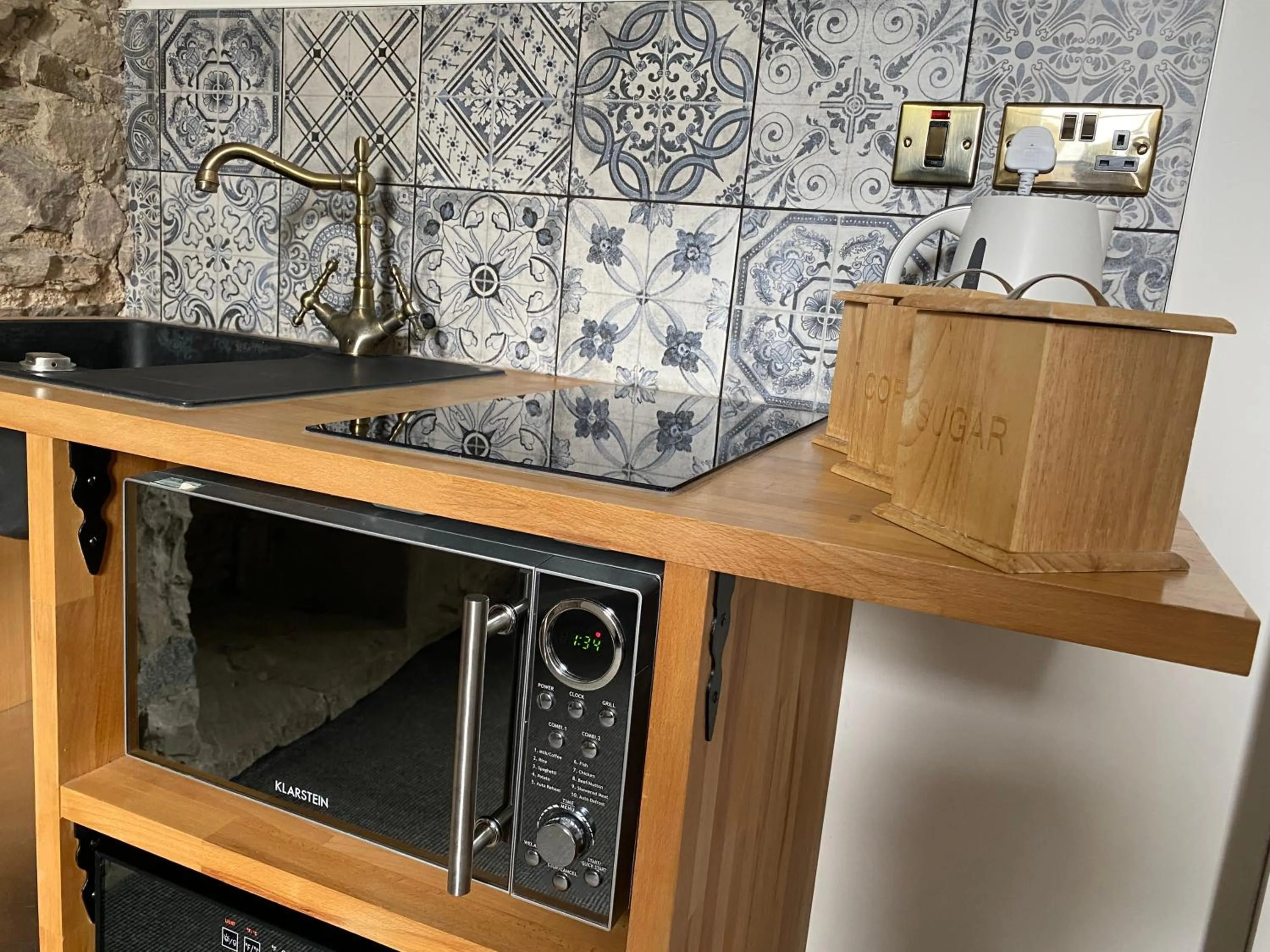 Kitchen or kitchenette in Queen Street Boutique Suites