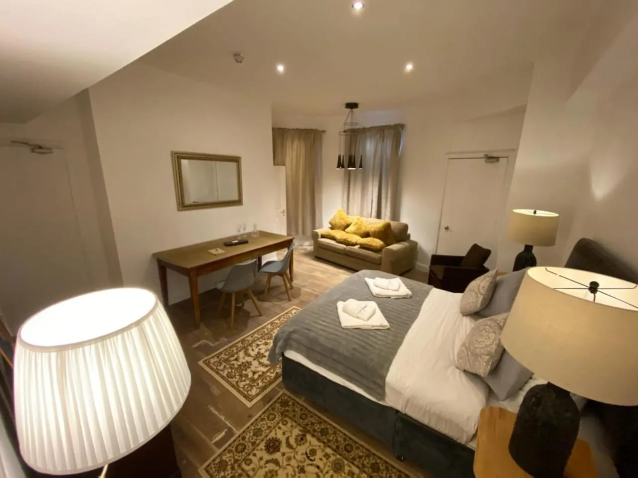 Photo of the whole room, Bed in Queen Street Boutique Suites