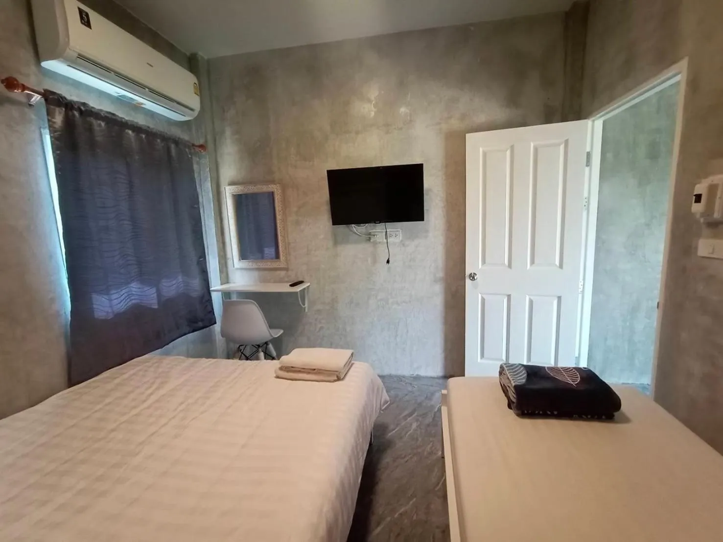 Bed in Baan Rabiangdao UthaiThani