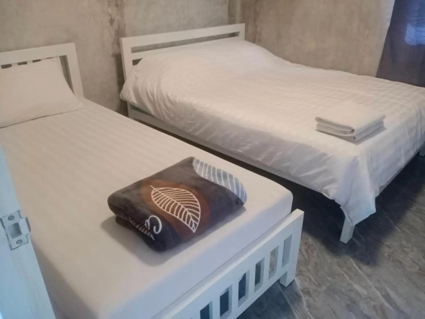 Bed in Baan Rabiangdao UthaiThani