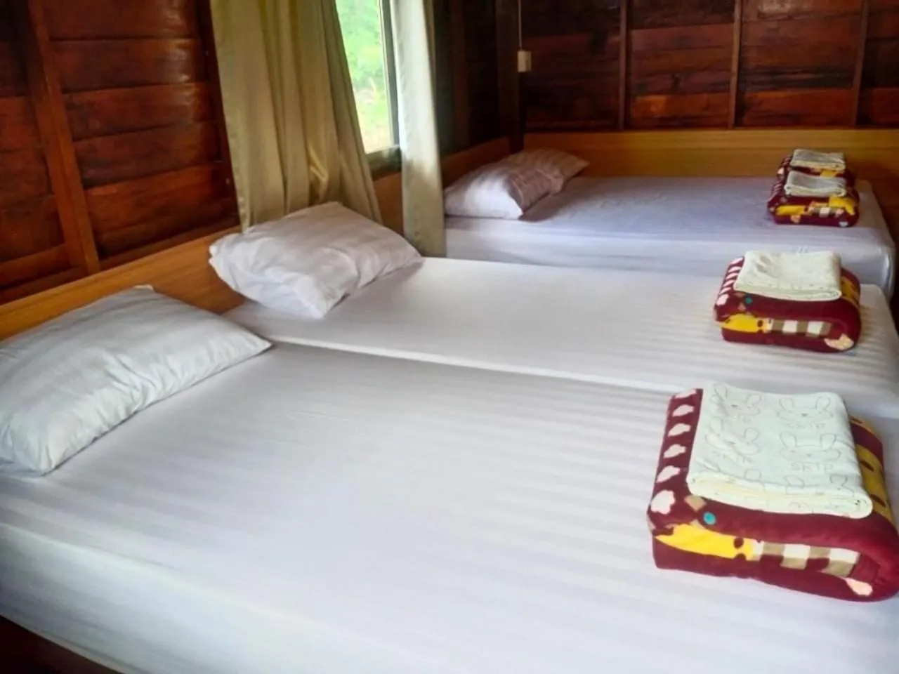 Bed in Baan Rabiangdao UthaiThani
