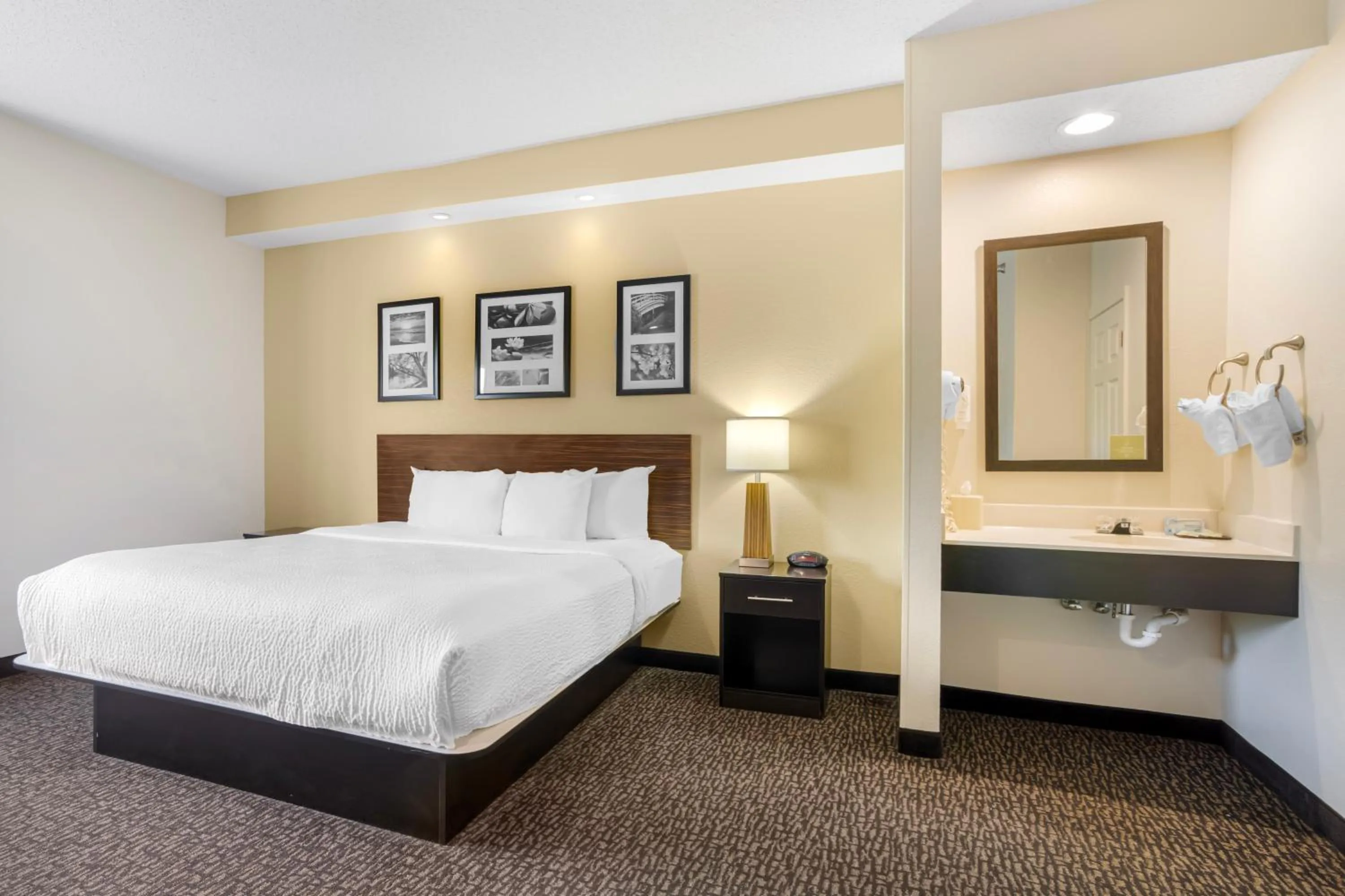 Bed in Sleep Inn & Suites at Concord Mills