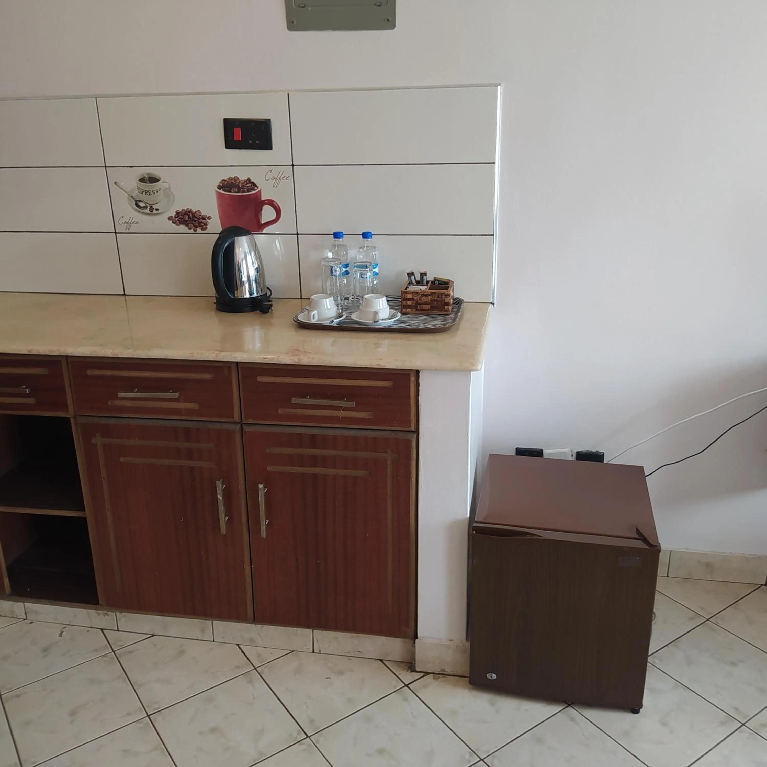 Kitchen or kitchenette in Plus254 Hotel