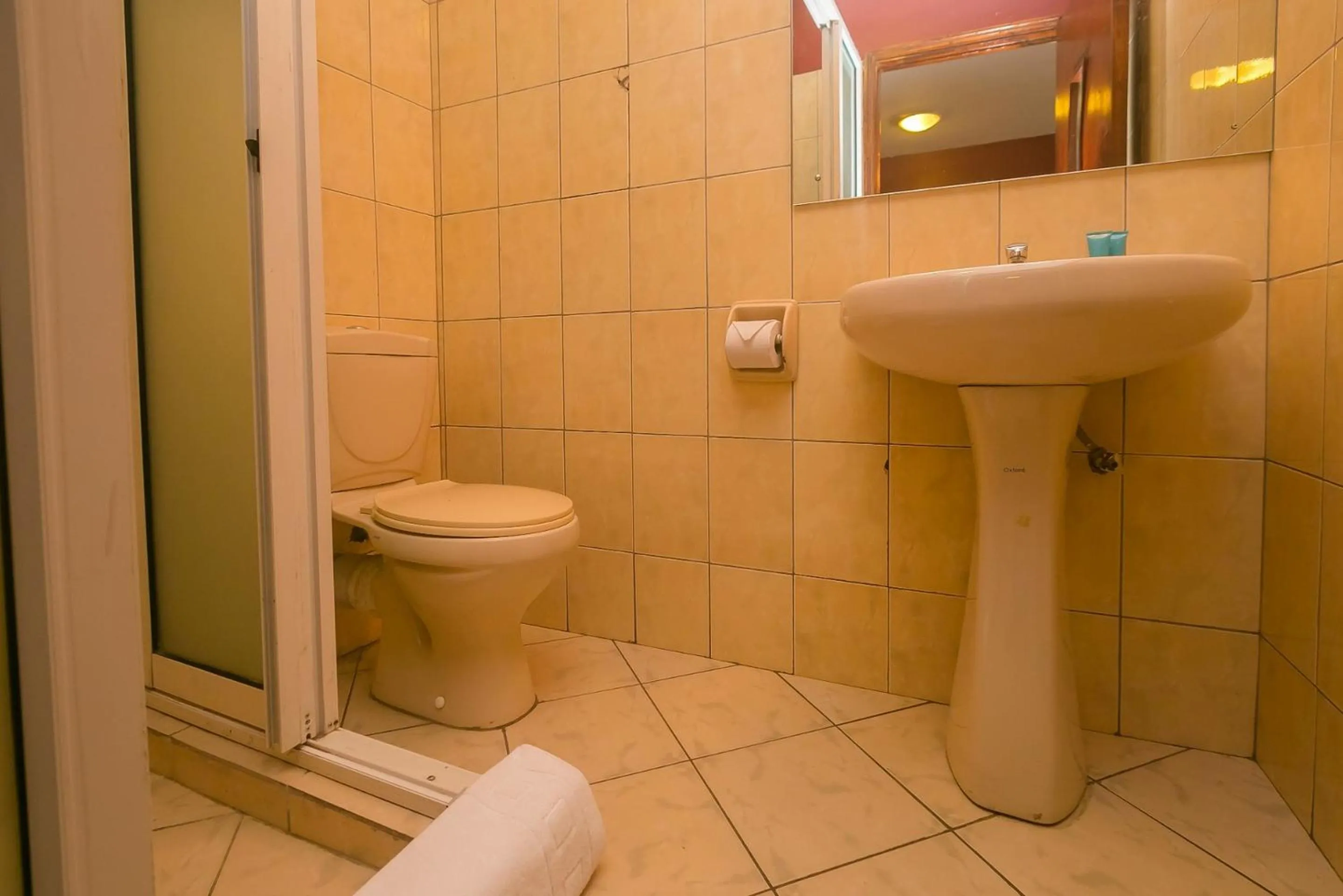 Bathroom in Plus254 Hotel