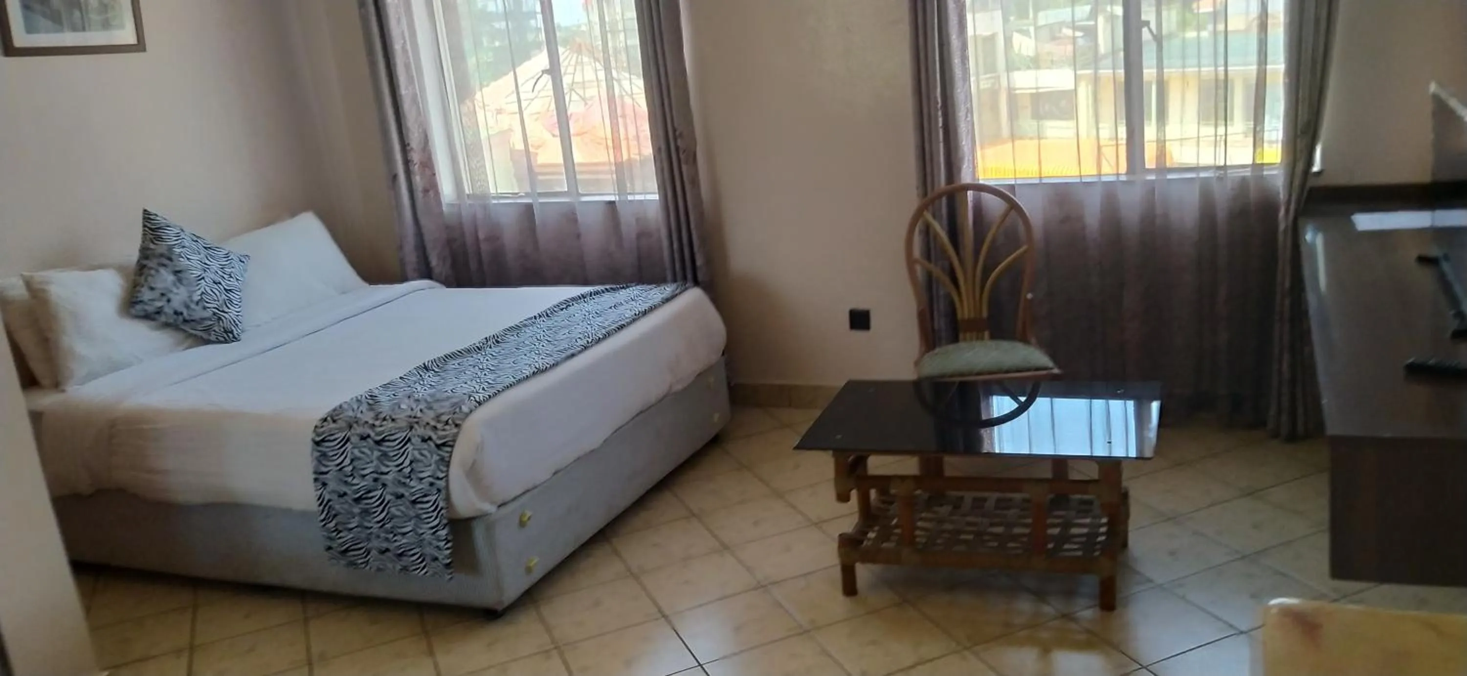 Seating area, Bed in Plus254 Hotel