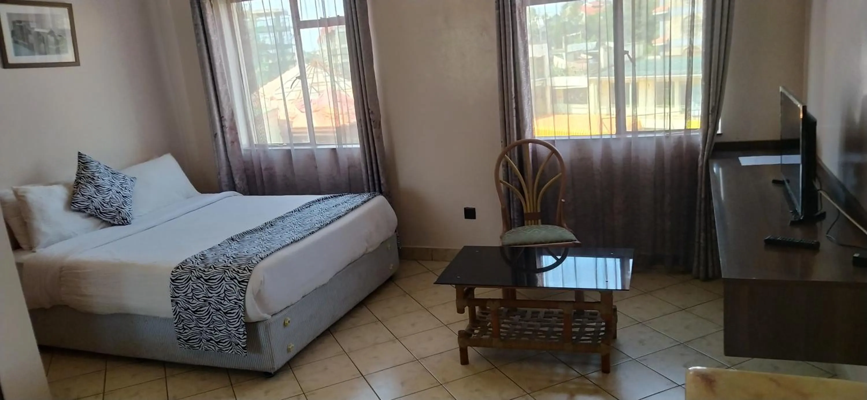 Photo of the whole room, Bed in Plus254 Hotel