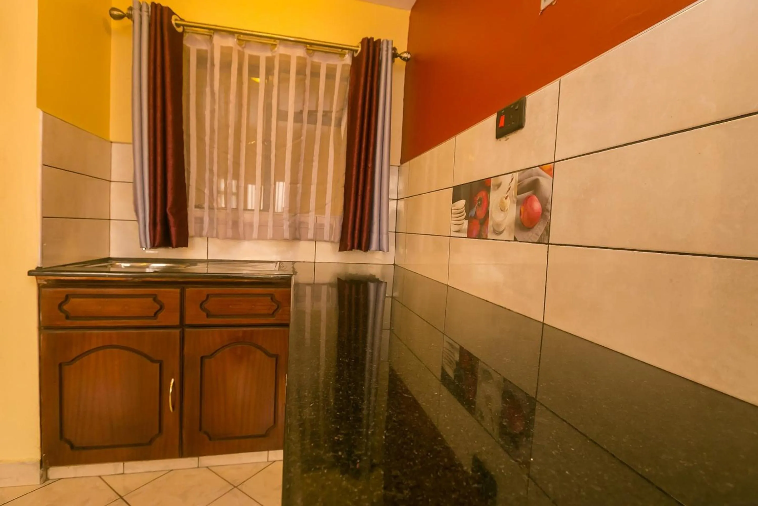 Kitchen or kitchenette in Plus254 Hotel