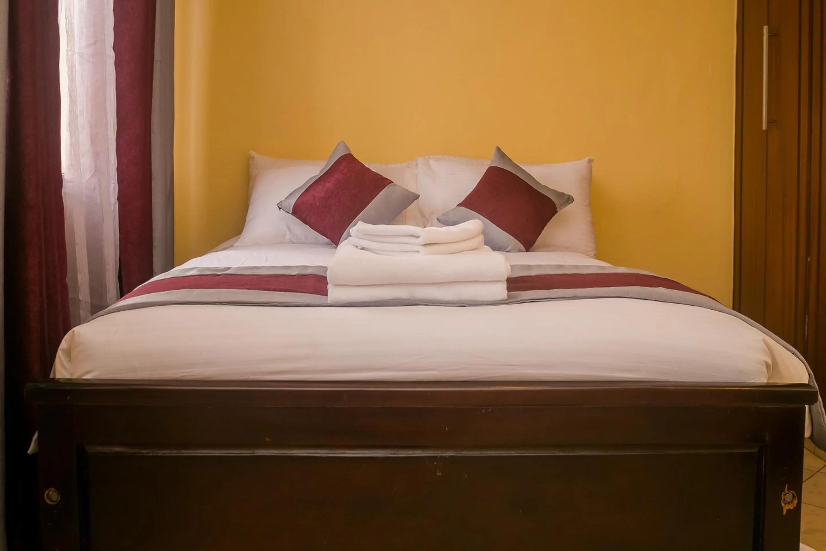 Bed in Plus254 Hotel