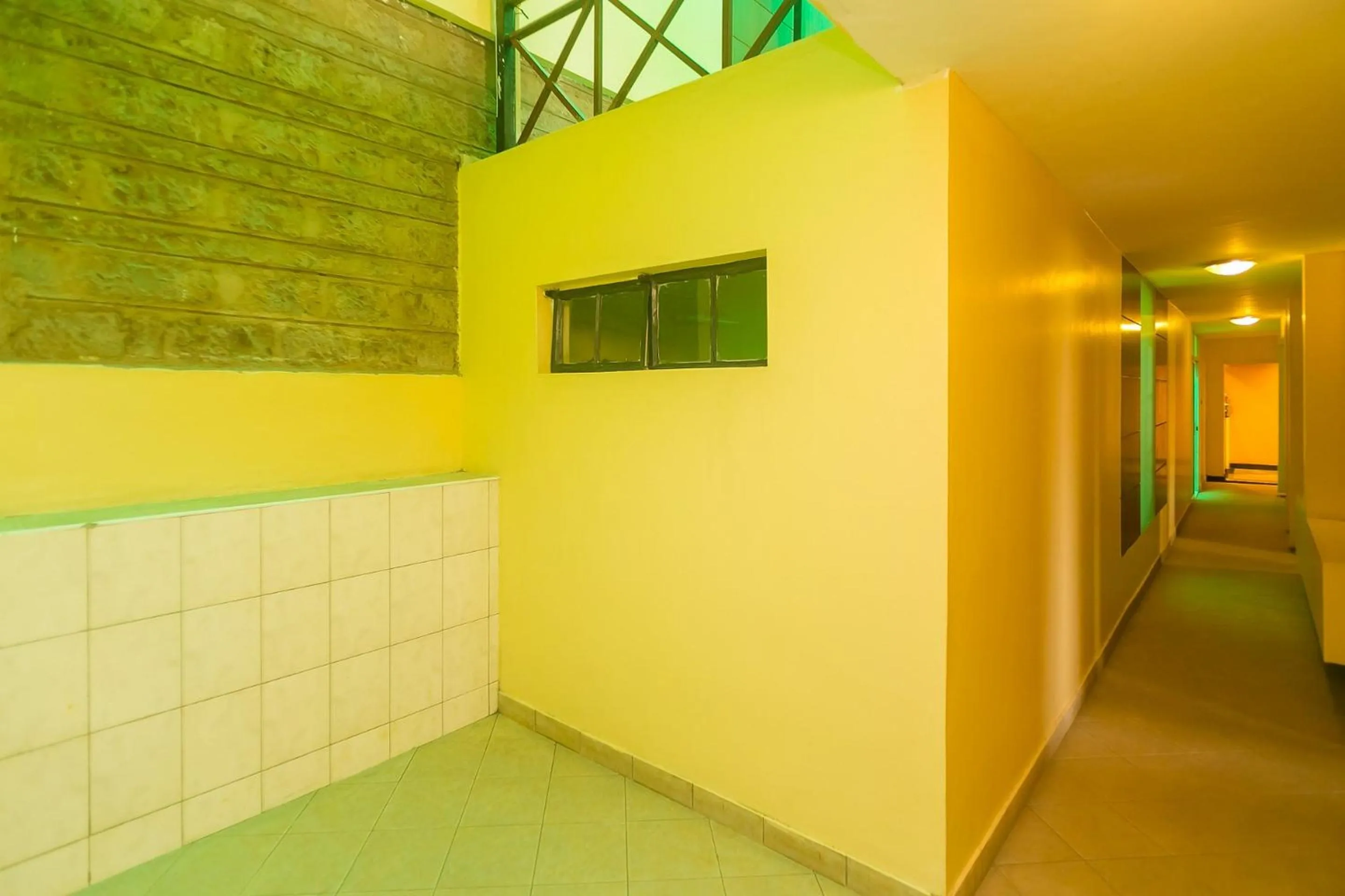 Communal lounge/ TV room in Plus254 Hotel