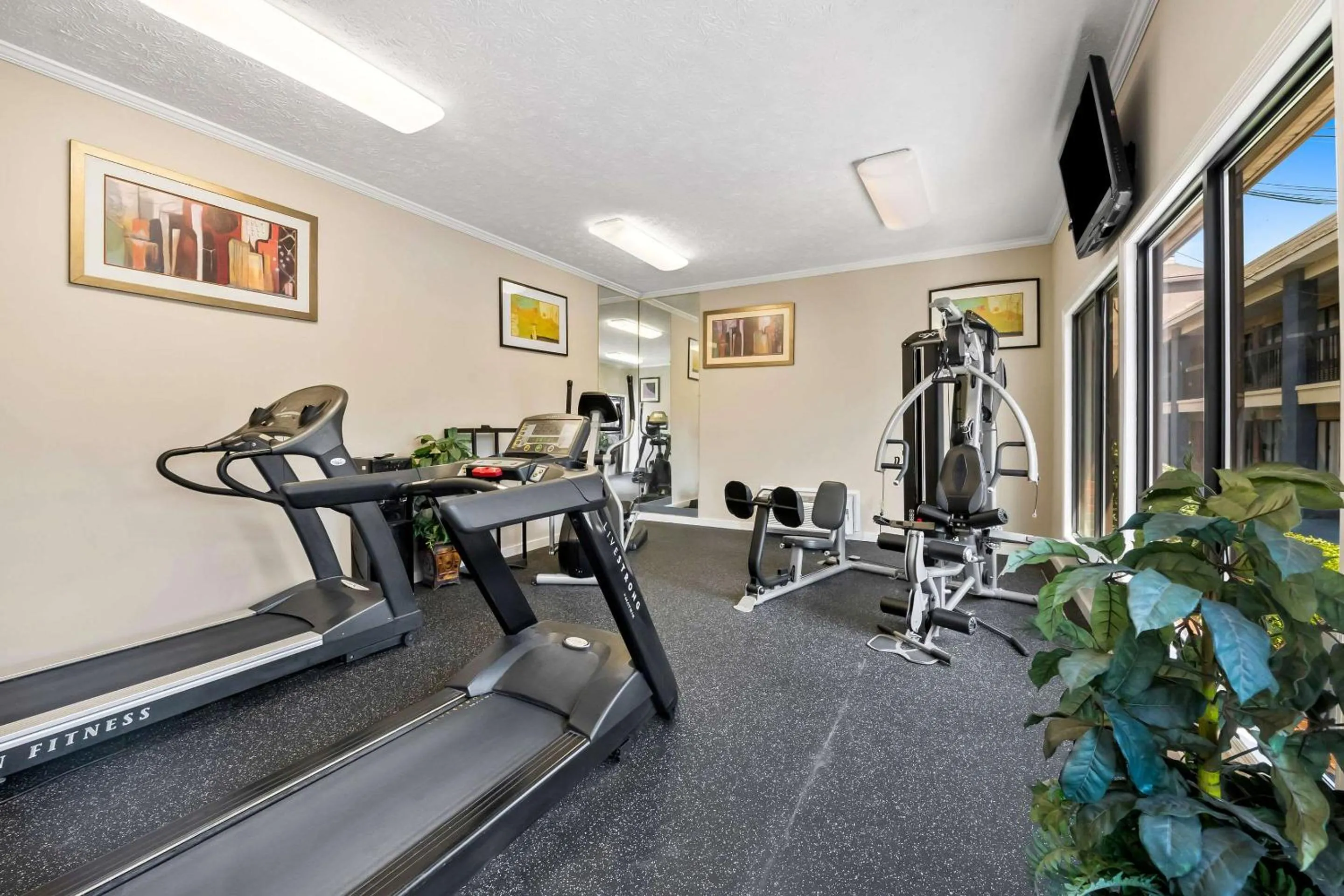 Fitness centre/facilities in SureStay Plus Hotel by Best Western Fayetteville