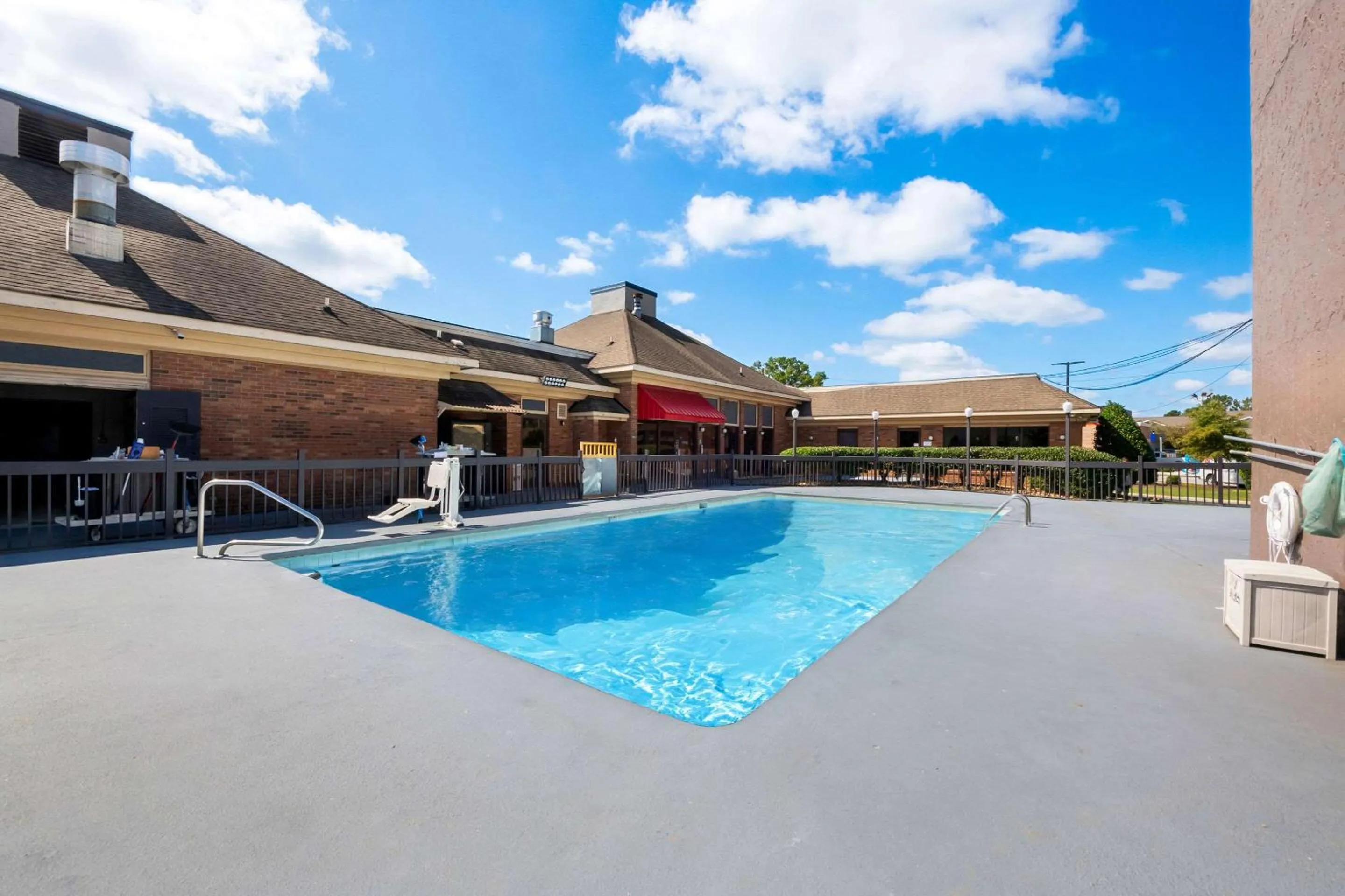 Swimming pool in SureStay Plus Hotel by Best Western Fayetteville