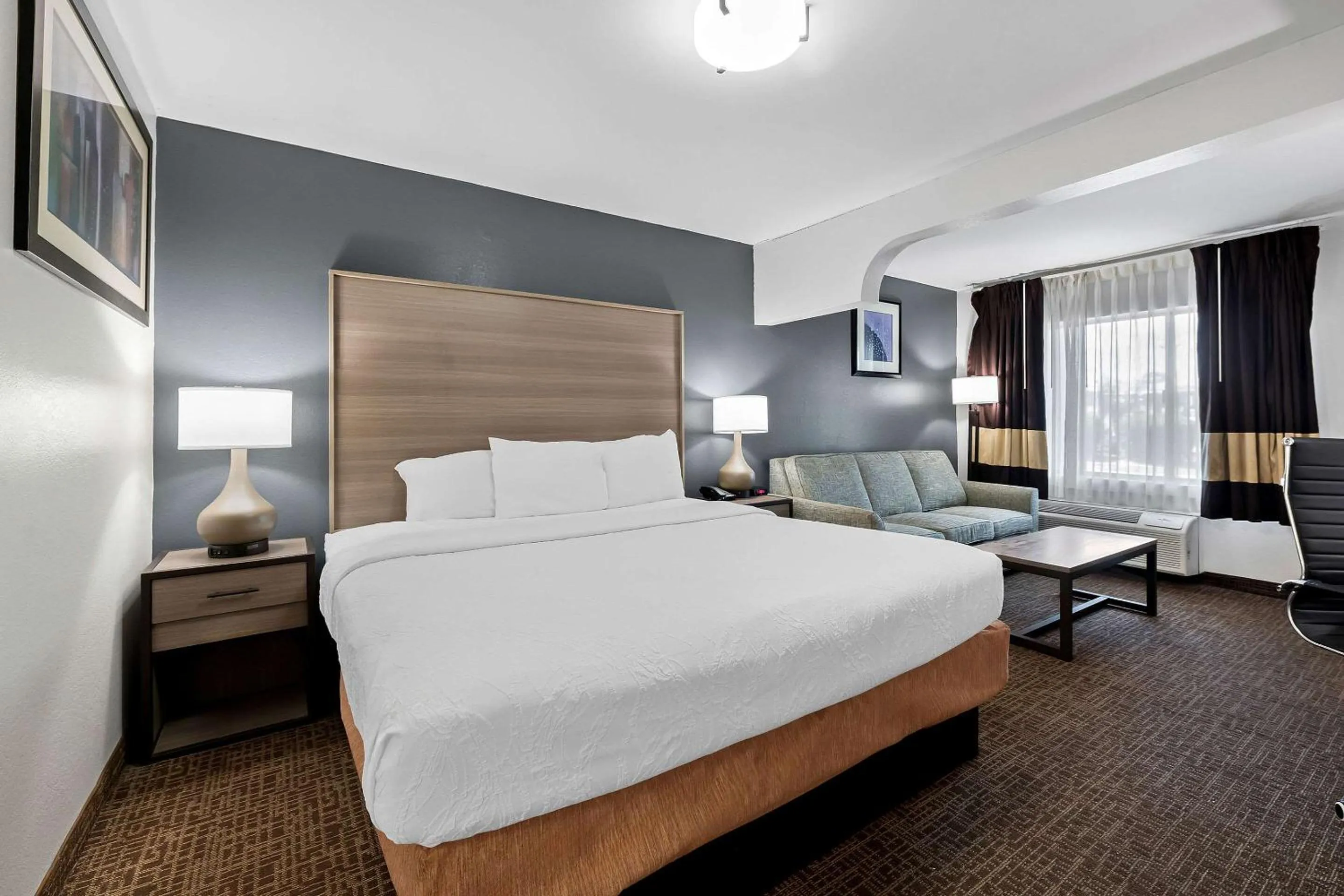 Bedroom, Bed in SureStay Plus Hotel by Best Western Fayetteville