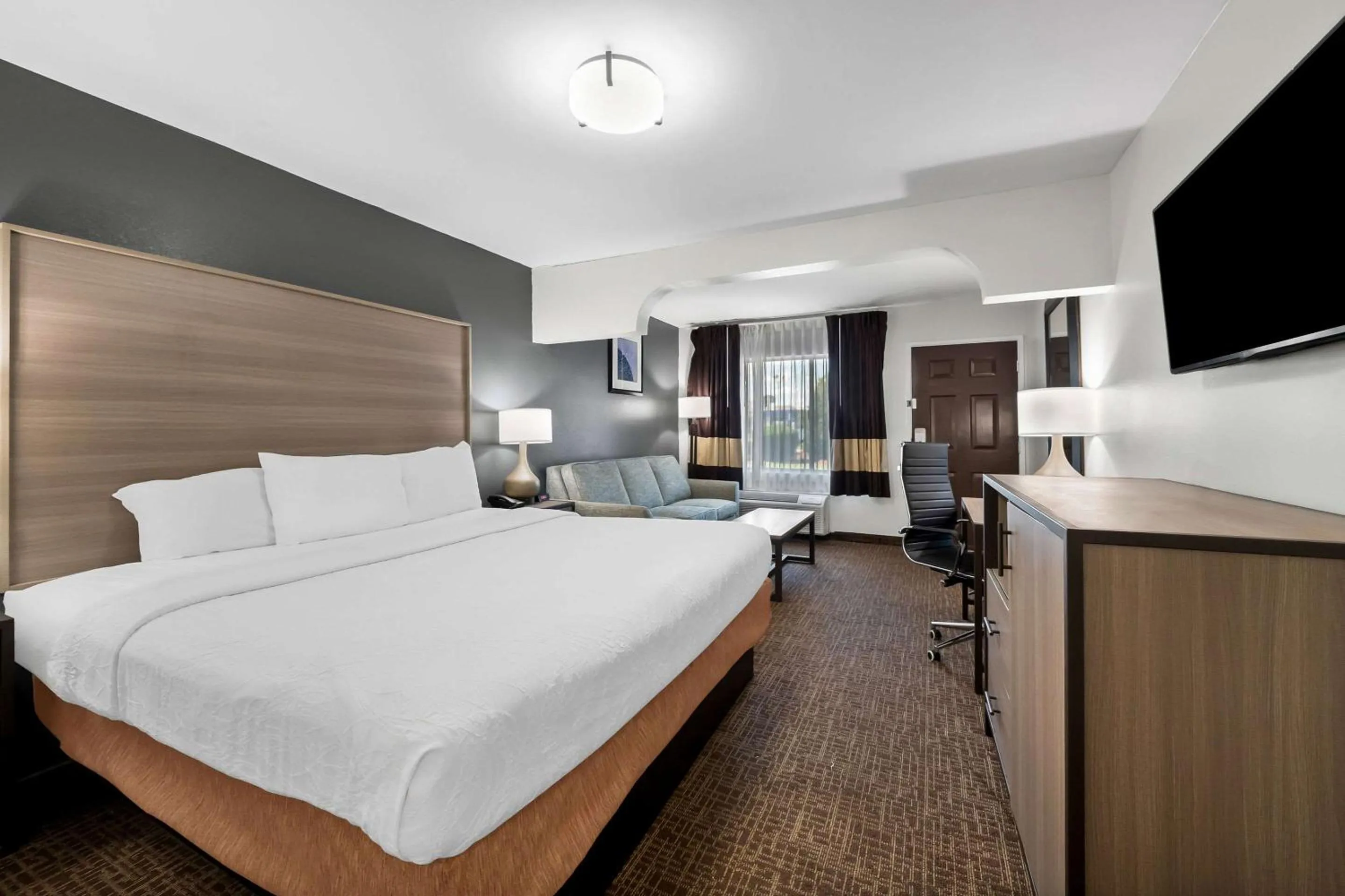 Bedroom, Bed in SureStay Plus Hotel by Best Western Fayetteville