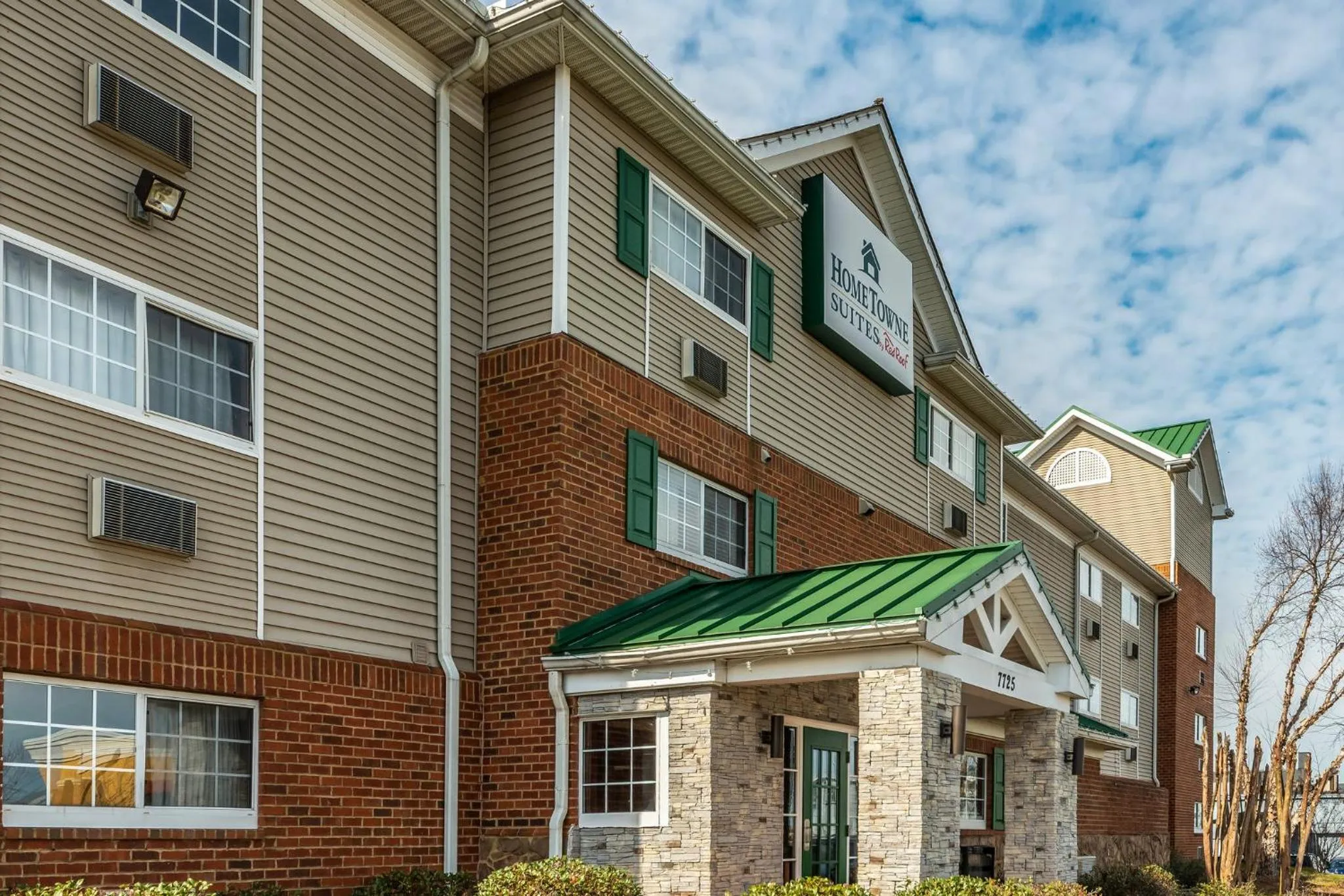 Property building in HomeTowne Studios & Suites by Red Roof Charlotte - Concord