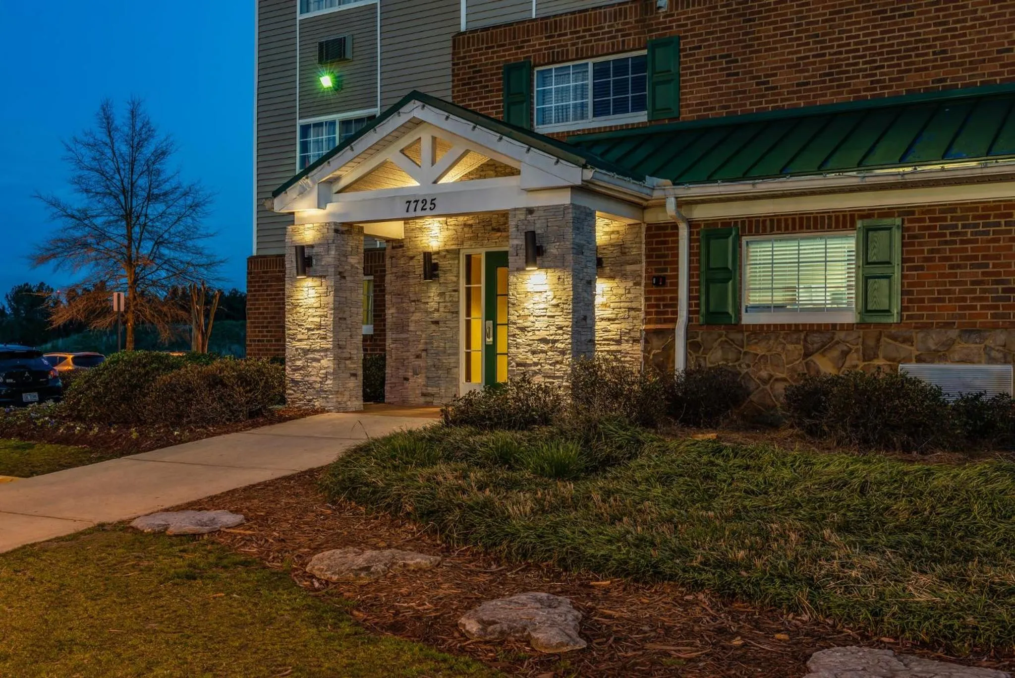 Property building in HomeTowne Studios & Suites by Red Roof Charlotte - Concord