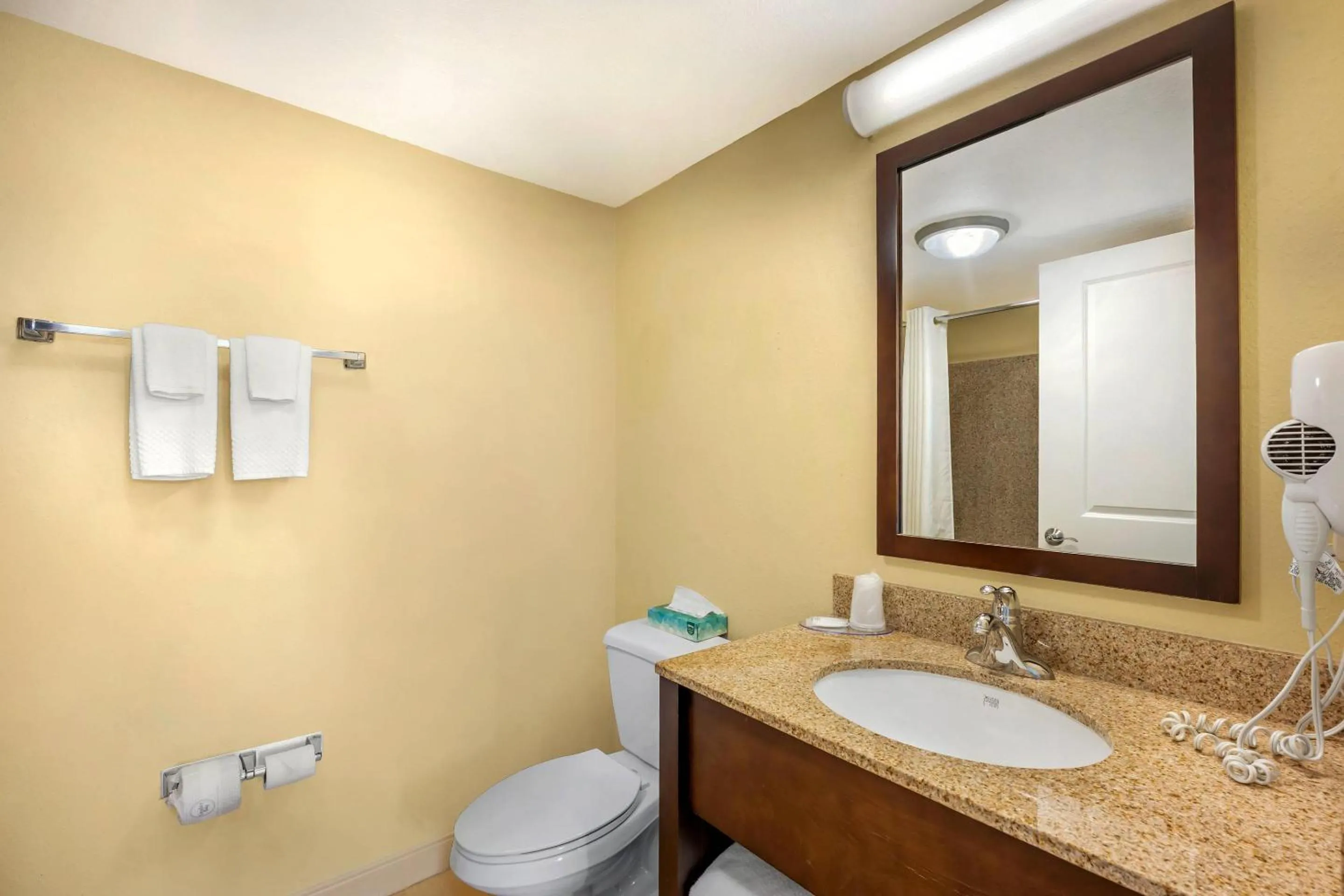 Bedroom in MainStay Suites Jacksonville near Camp Lejeune