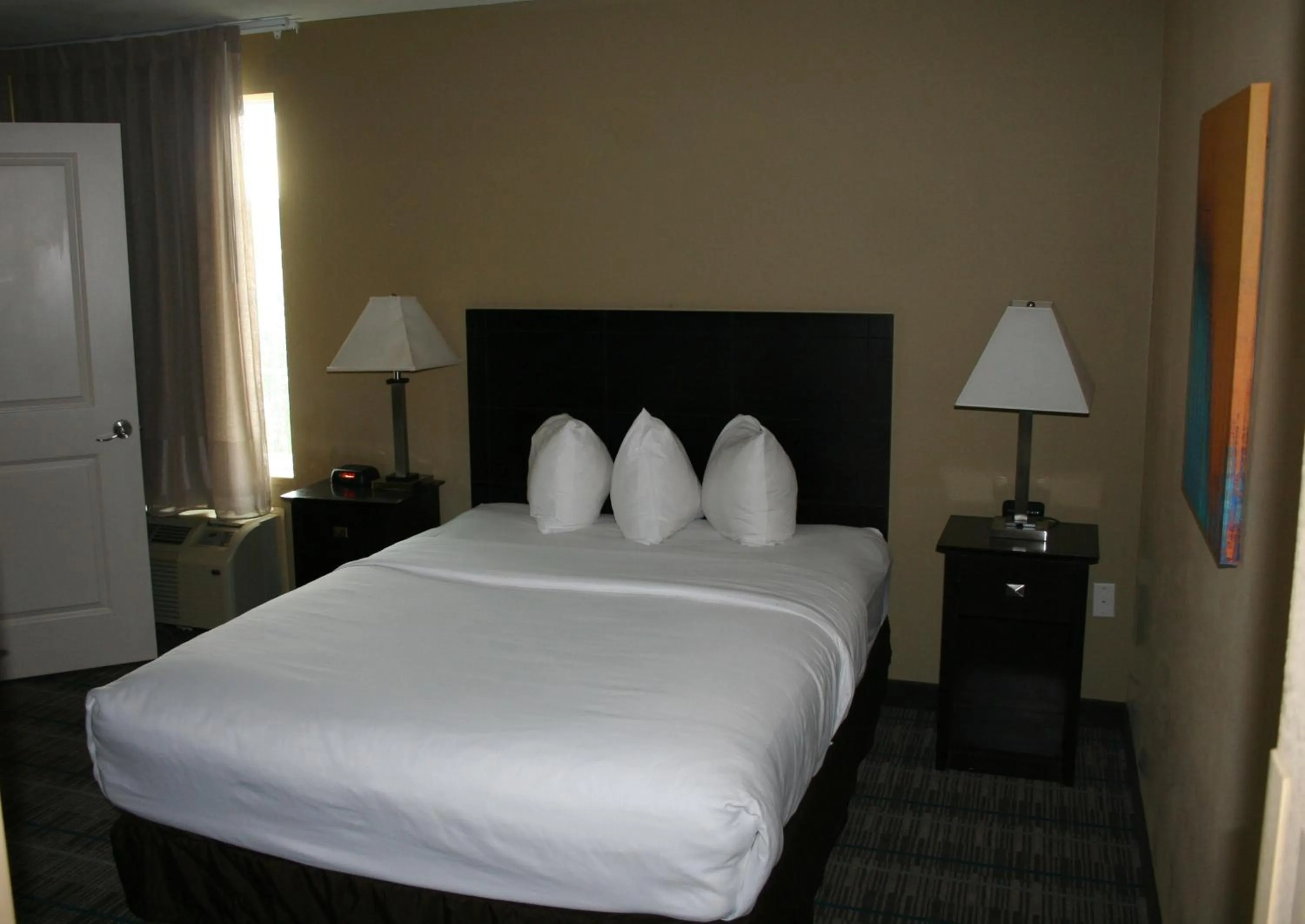 Bedroom, Bed in MainStay Suites Jacksonville near Camp Lejeune