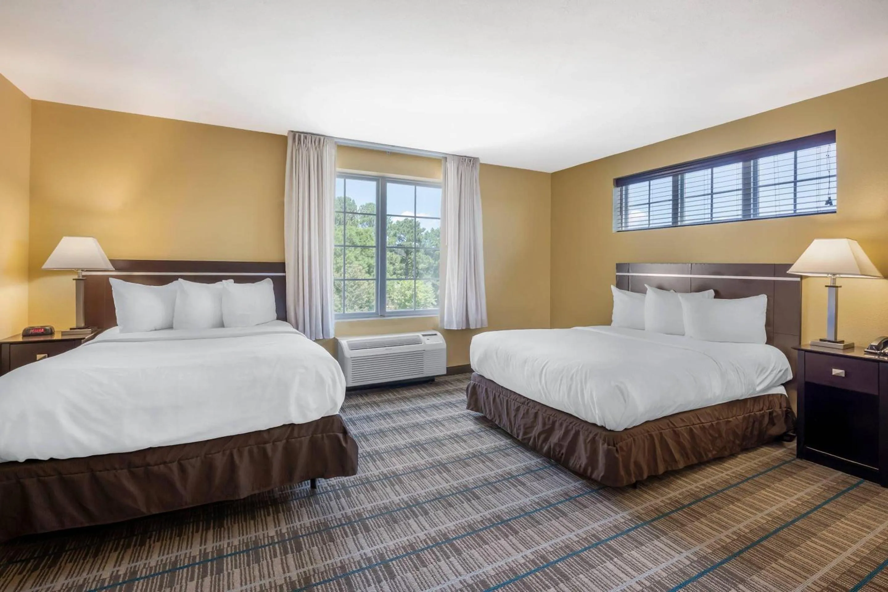 Bedroom, Bed in MainStay Suites Jacksonville near Camp Lejeune