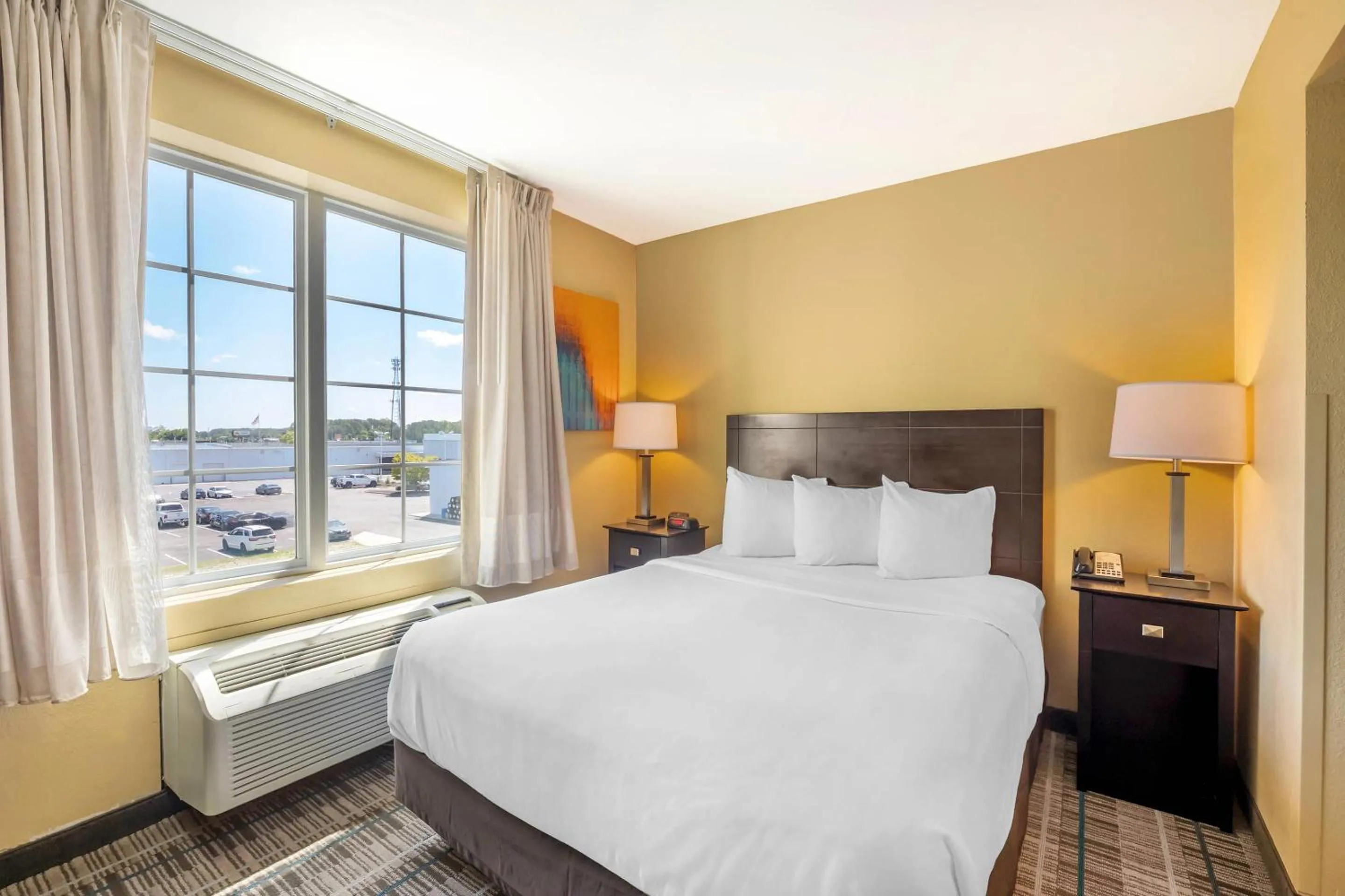 Bedroom, Bed in MainStay Suites Jacksonville near Camp Lejeune