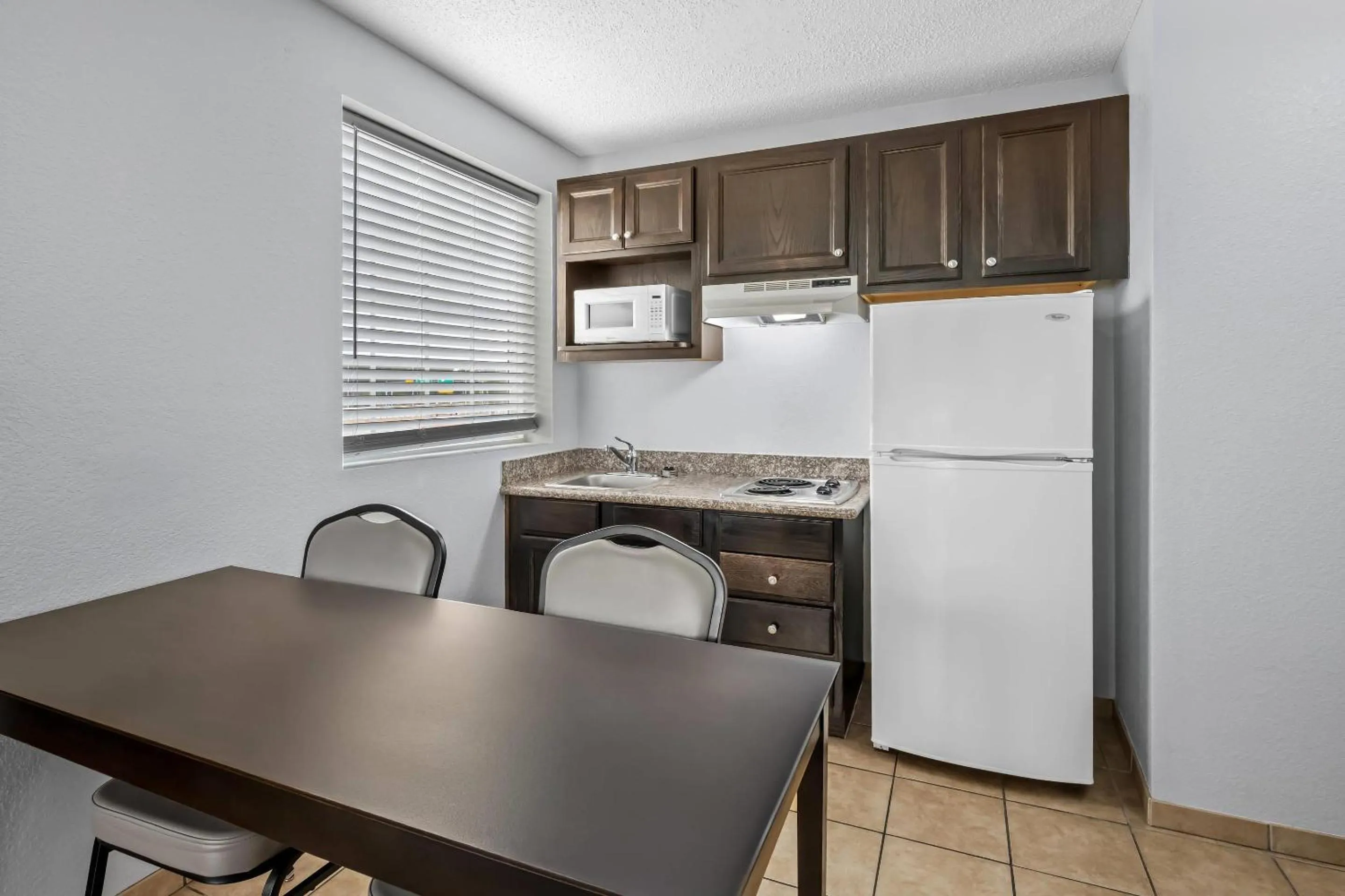 Bedroom in Suburban Studios Near Camp Lejeune