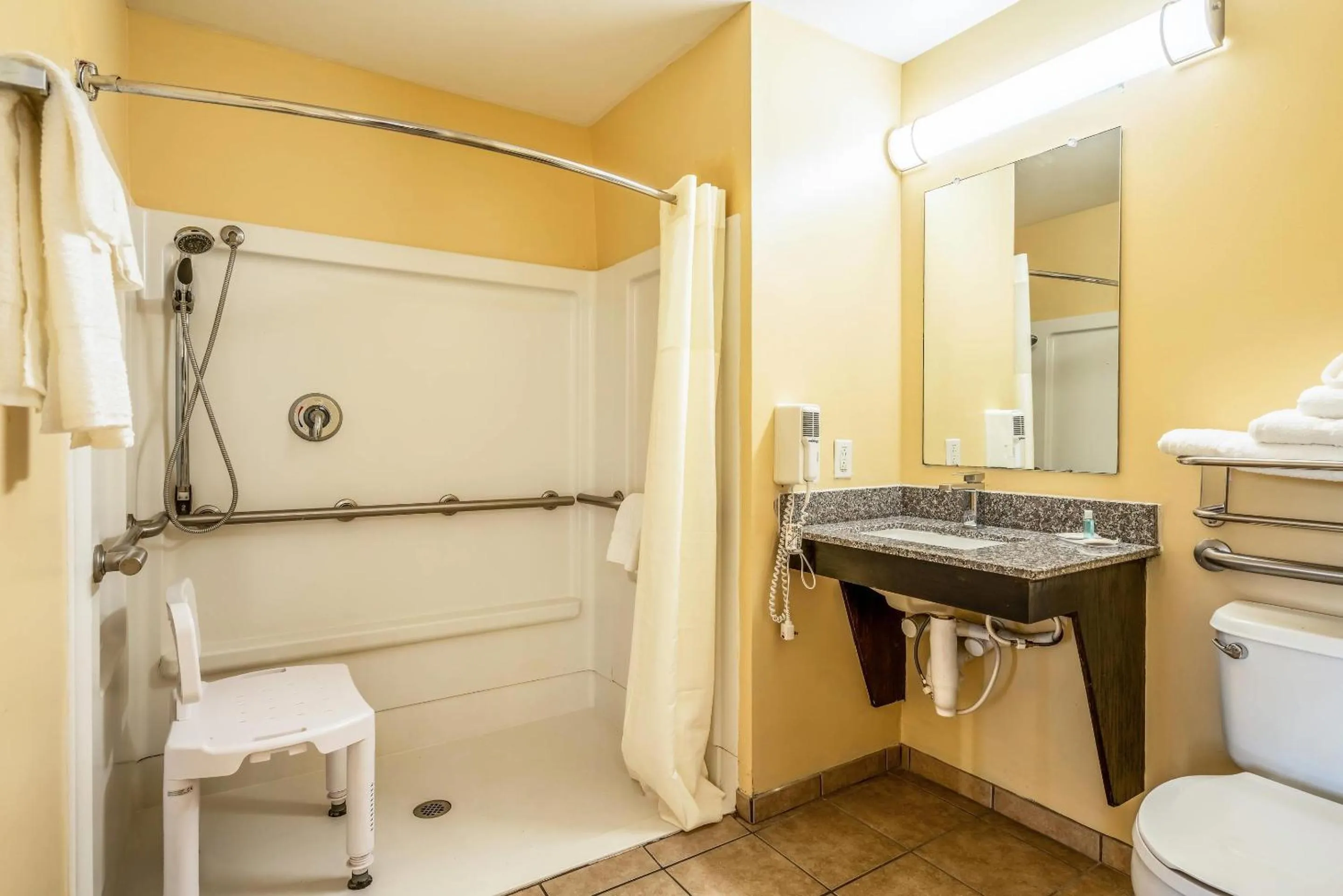 Bedroom in Suburban Studios Near Camp Lejeune