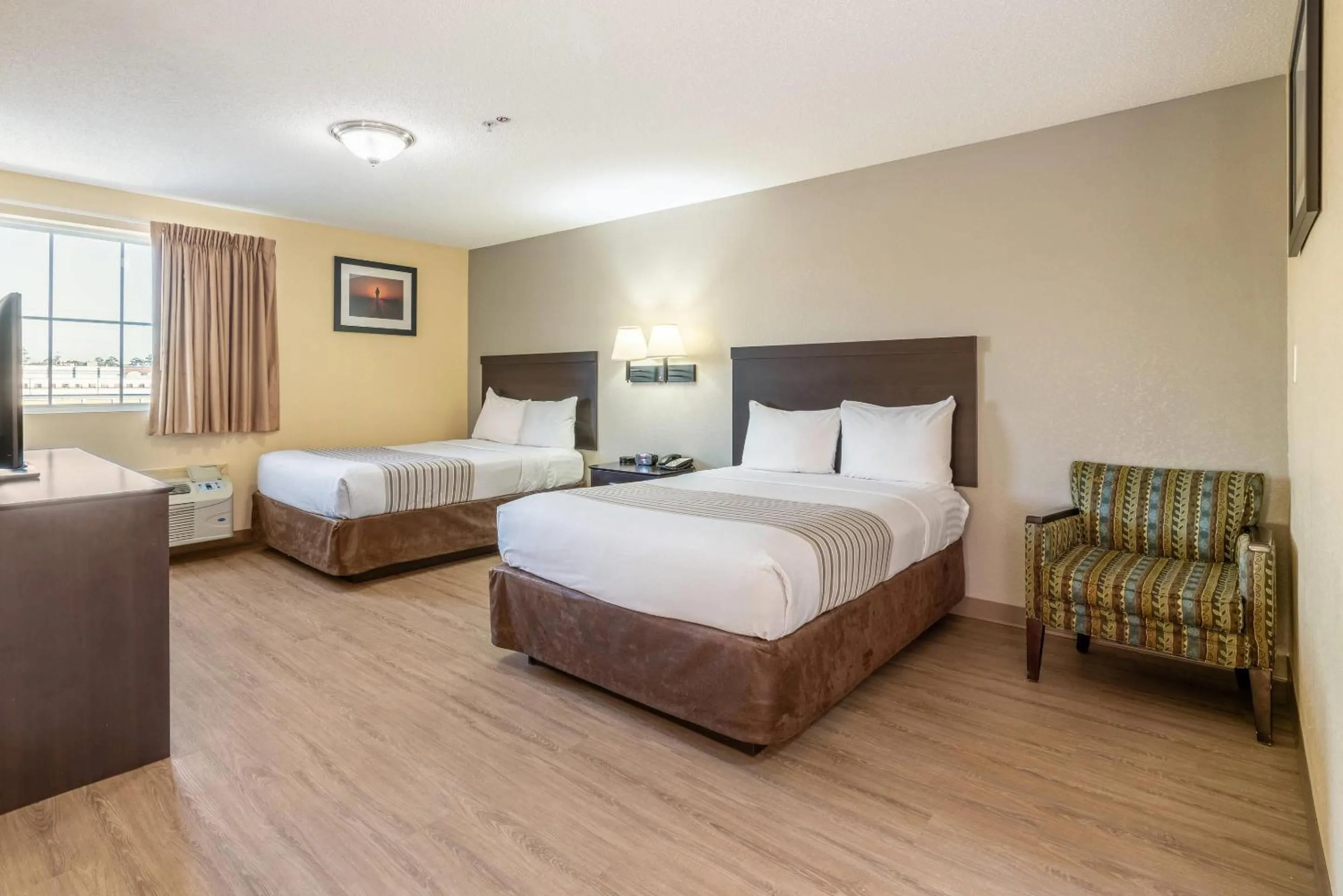 Bedroom, Bed in Suburban Studios Near Camp Lejeune
