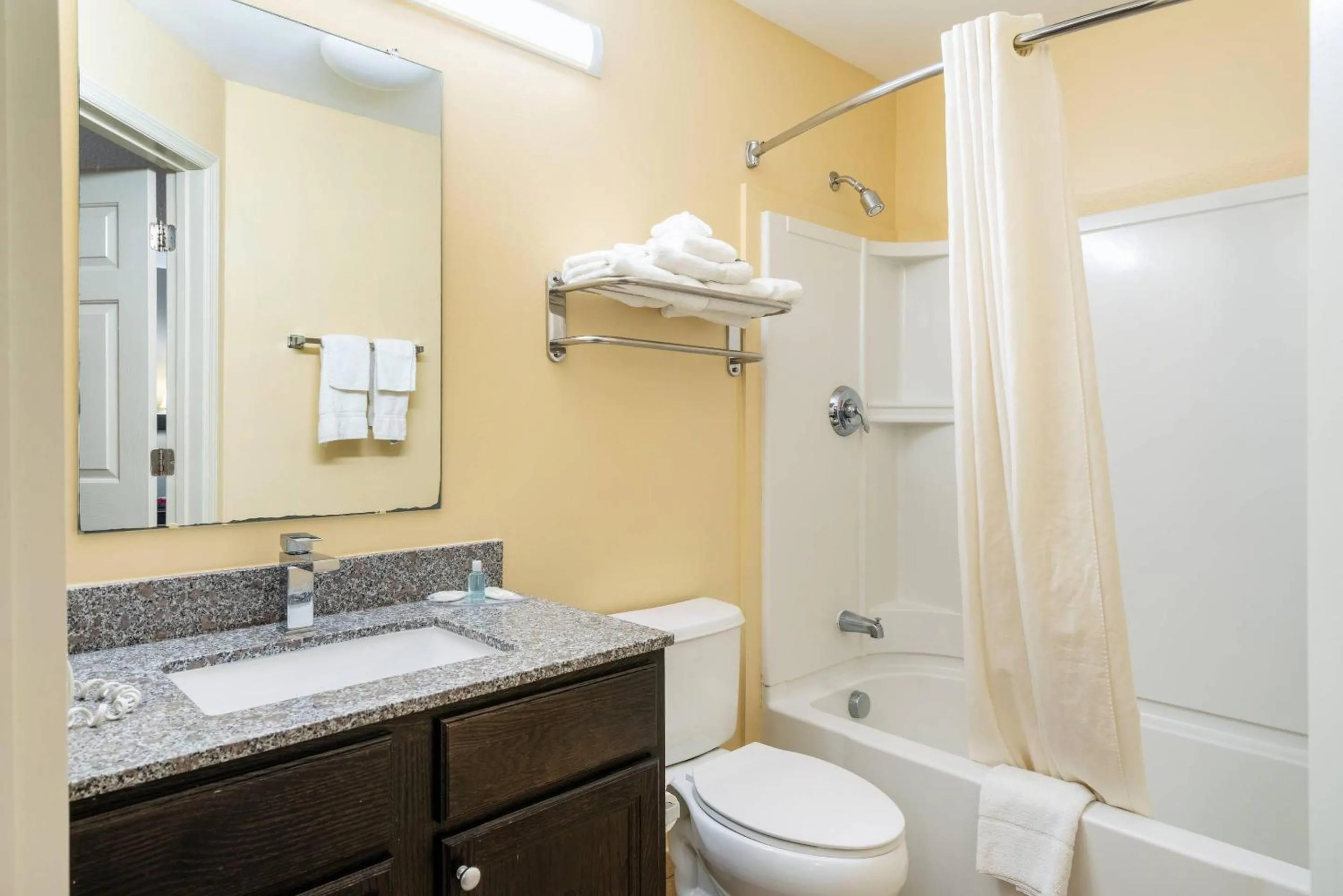 Bedroom in Suburban Studios Near Camp Lejeune