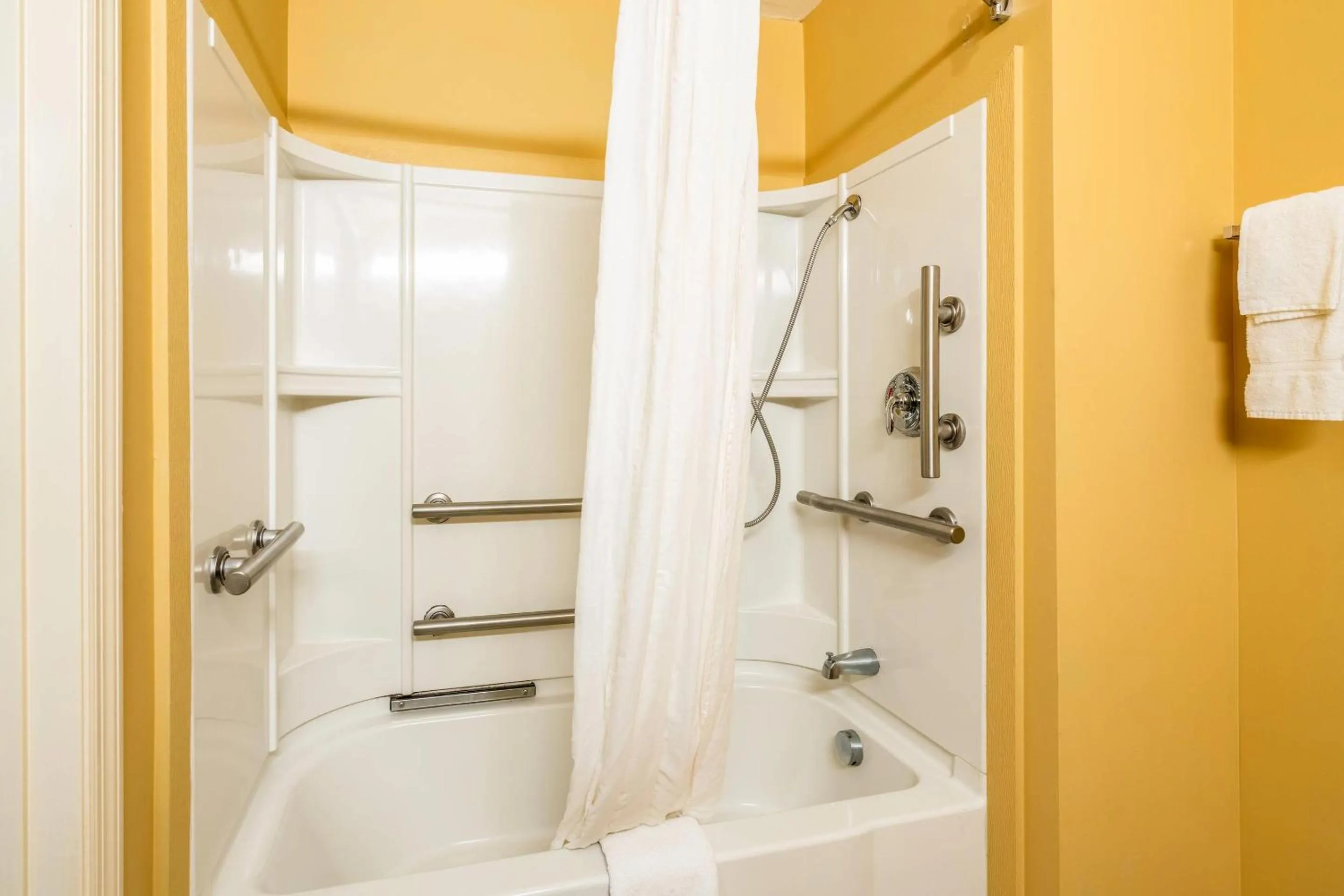 Bedroom in Suburban Studios Near Camp Lejeune