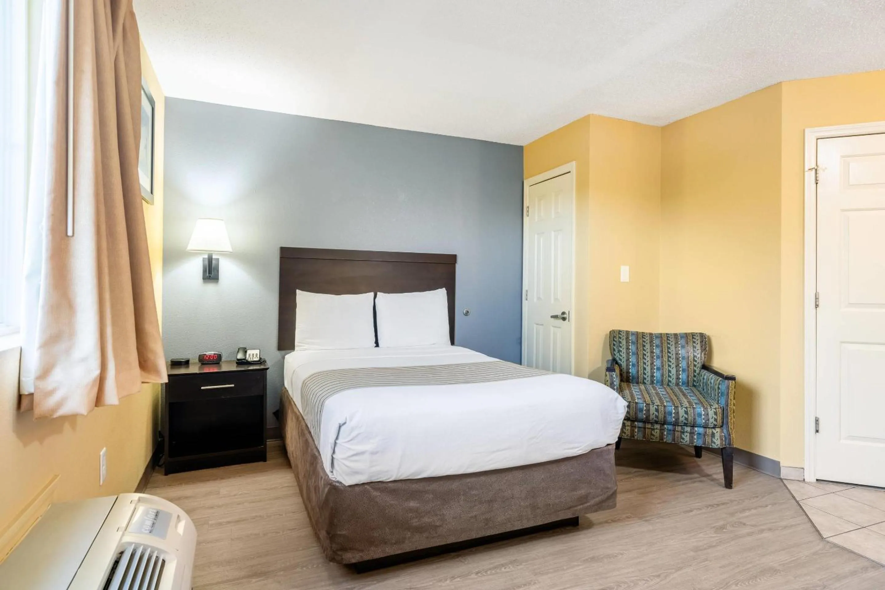 Bedroom, Bed in Suburban Studios Near Camp Lejeune