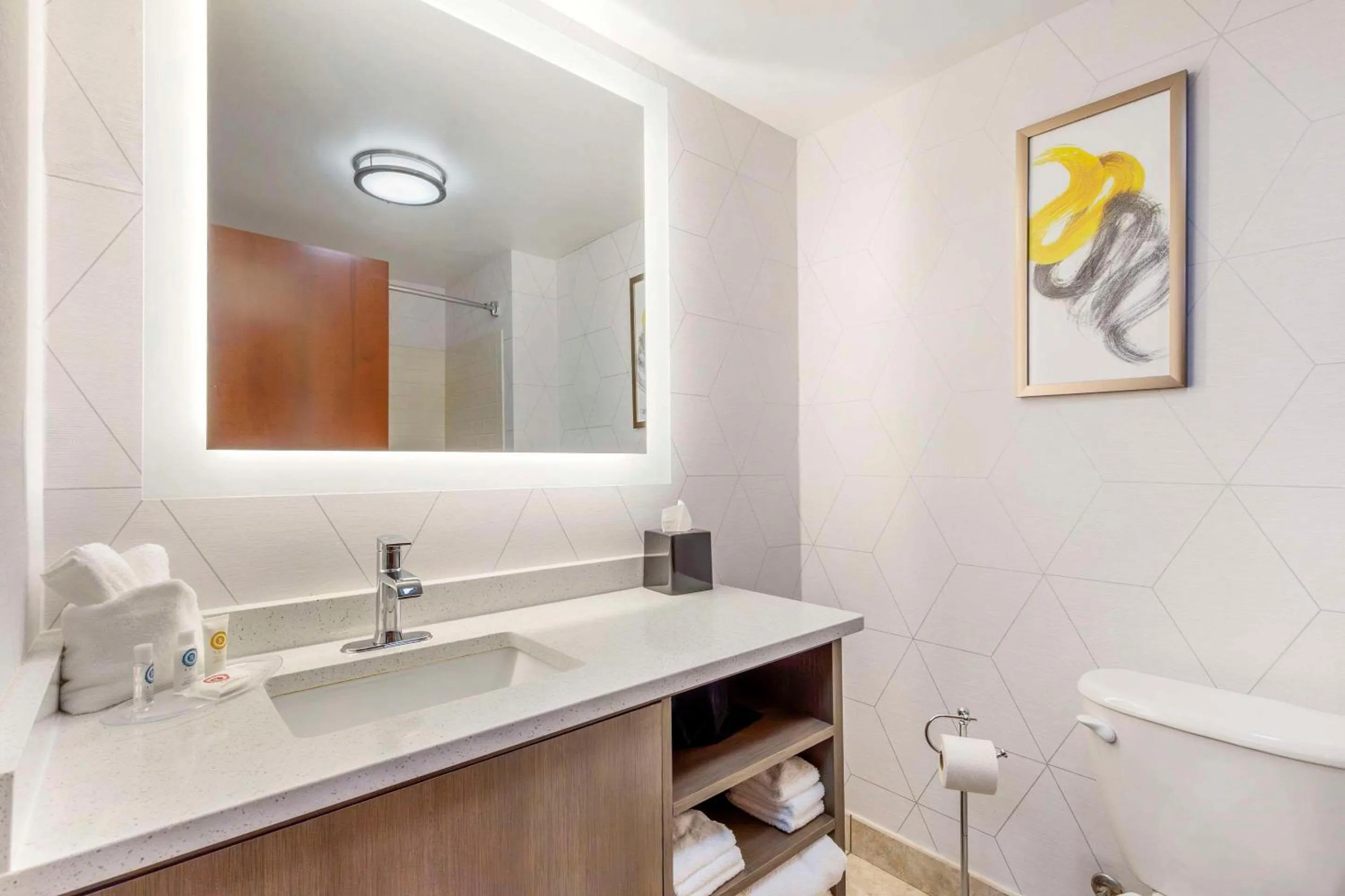 Bedroom in Comfort Suites Whitsett - Greensboro East