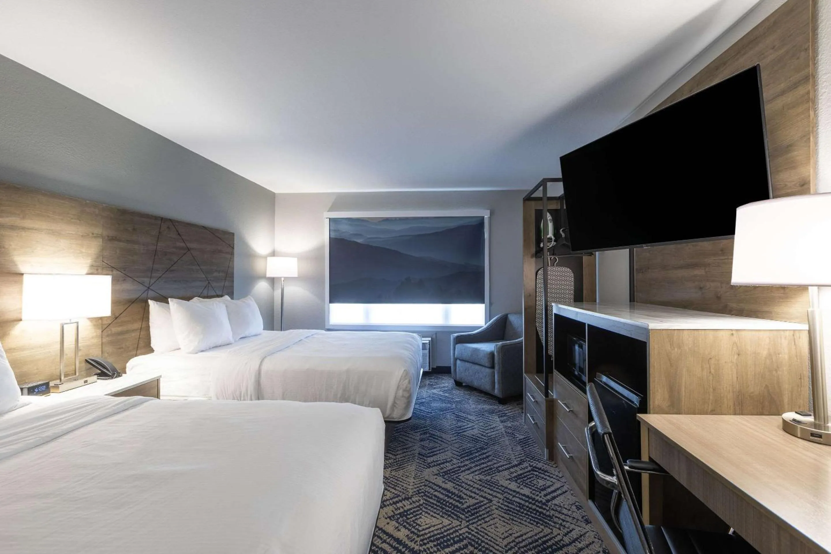 Bedroom, Bed in Rodeway Inn & Suites near Outlet Mall - Asheville