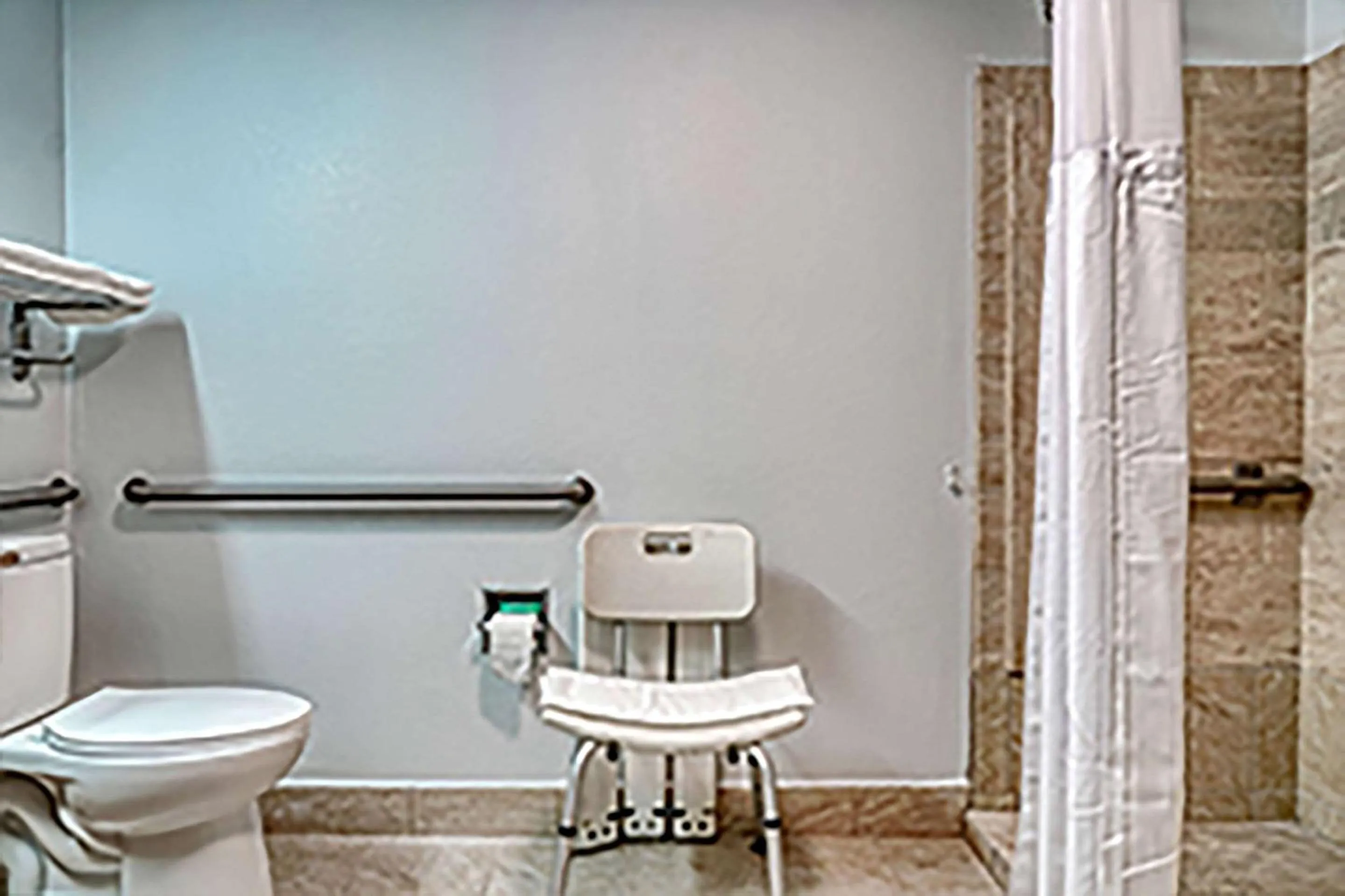 Bedroom in Econo Lodge Raleigh near Walnut Creek Amphitheatre