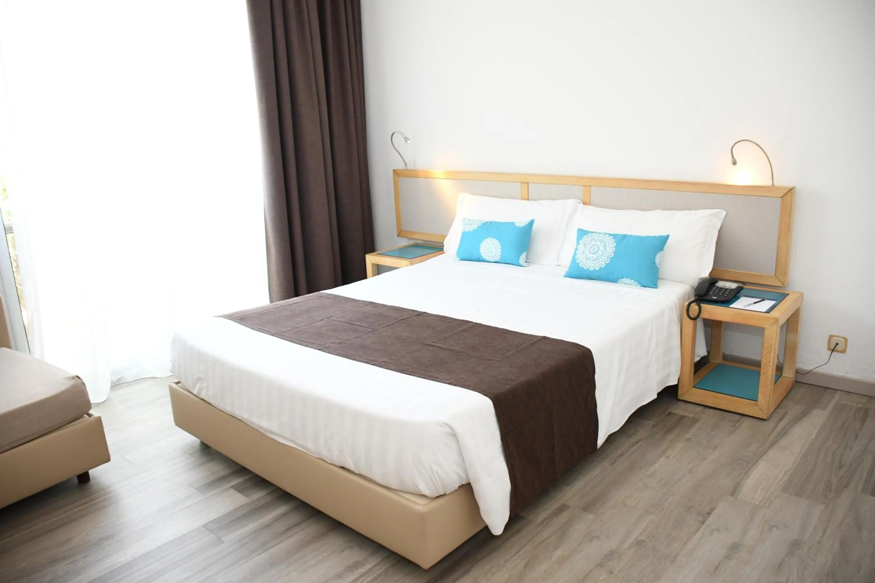 Photo of the whole room, Bed in Baia di Conte Resort