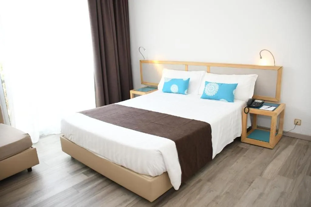 Bed in Baia di Conte Resort