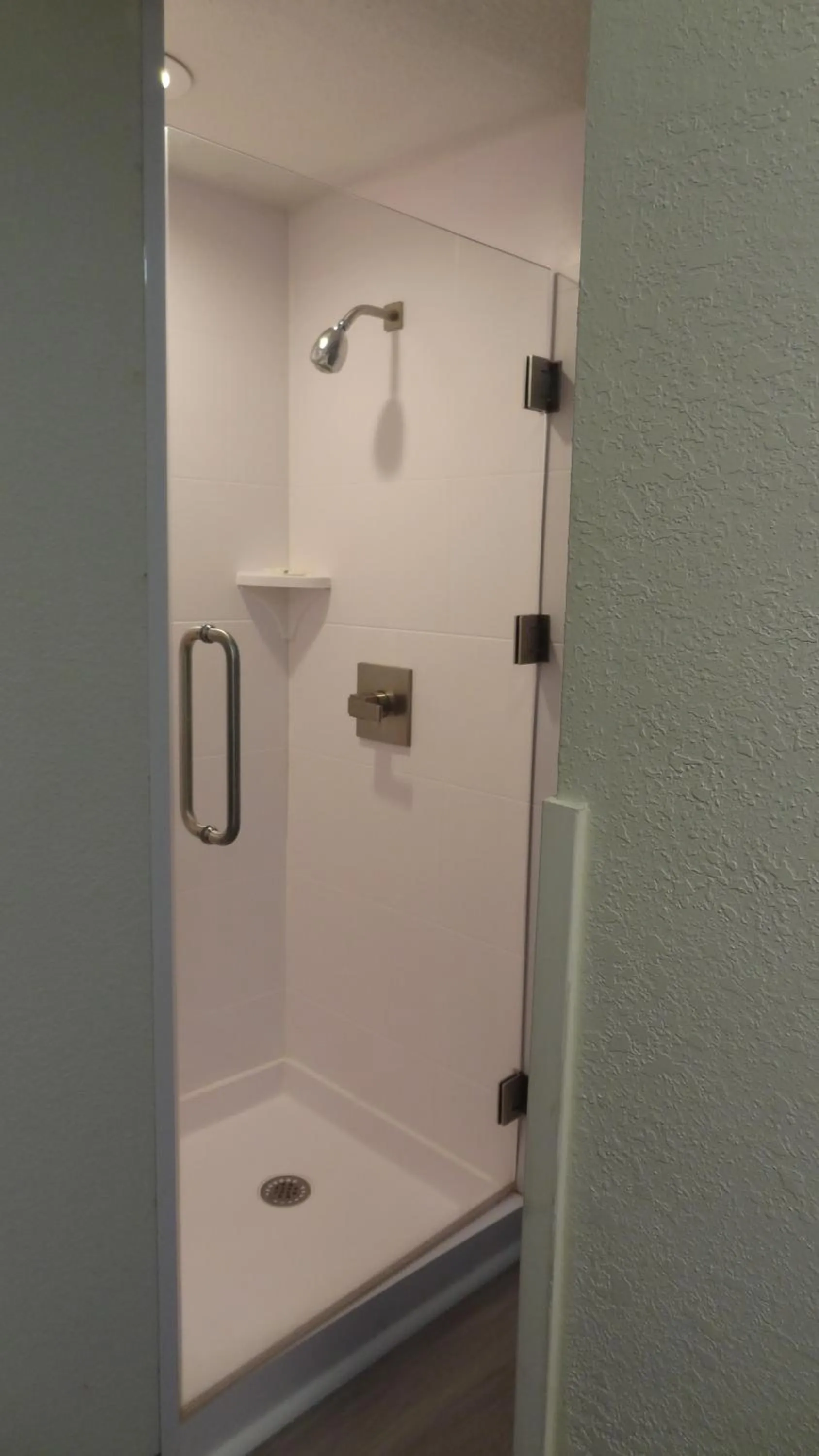 Shower in Quality Inn & Suites Raleigh North