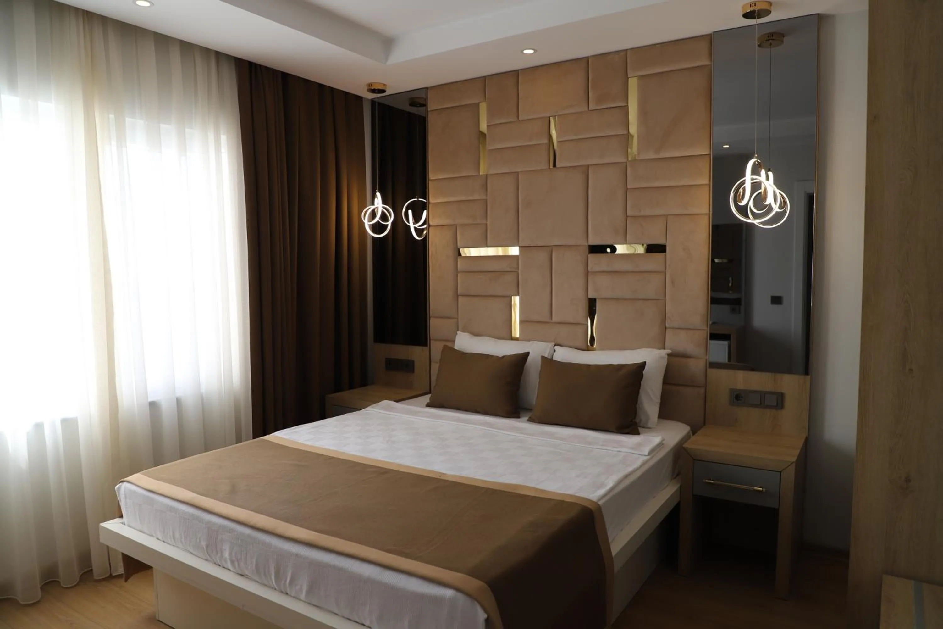 Bed in Lara Garden Hotel