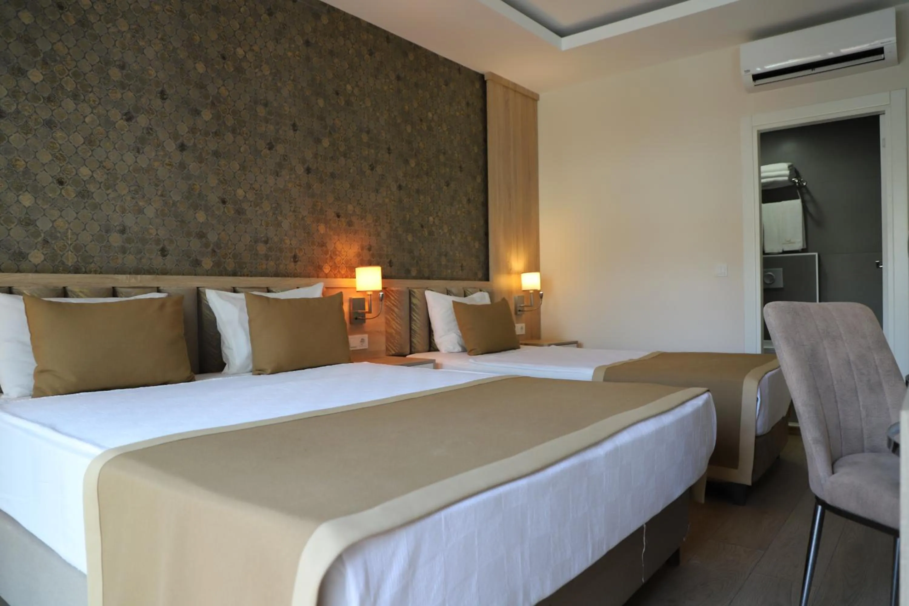 Bed in Lara Garden Hotel