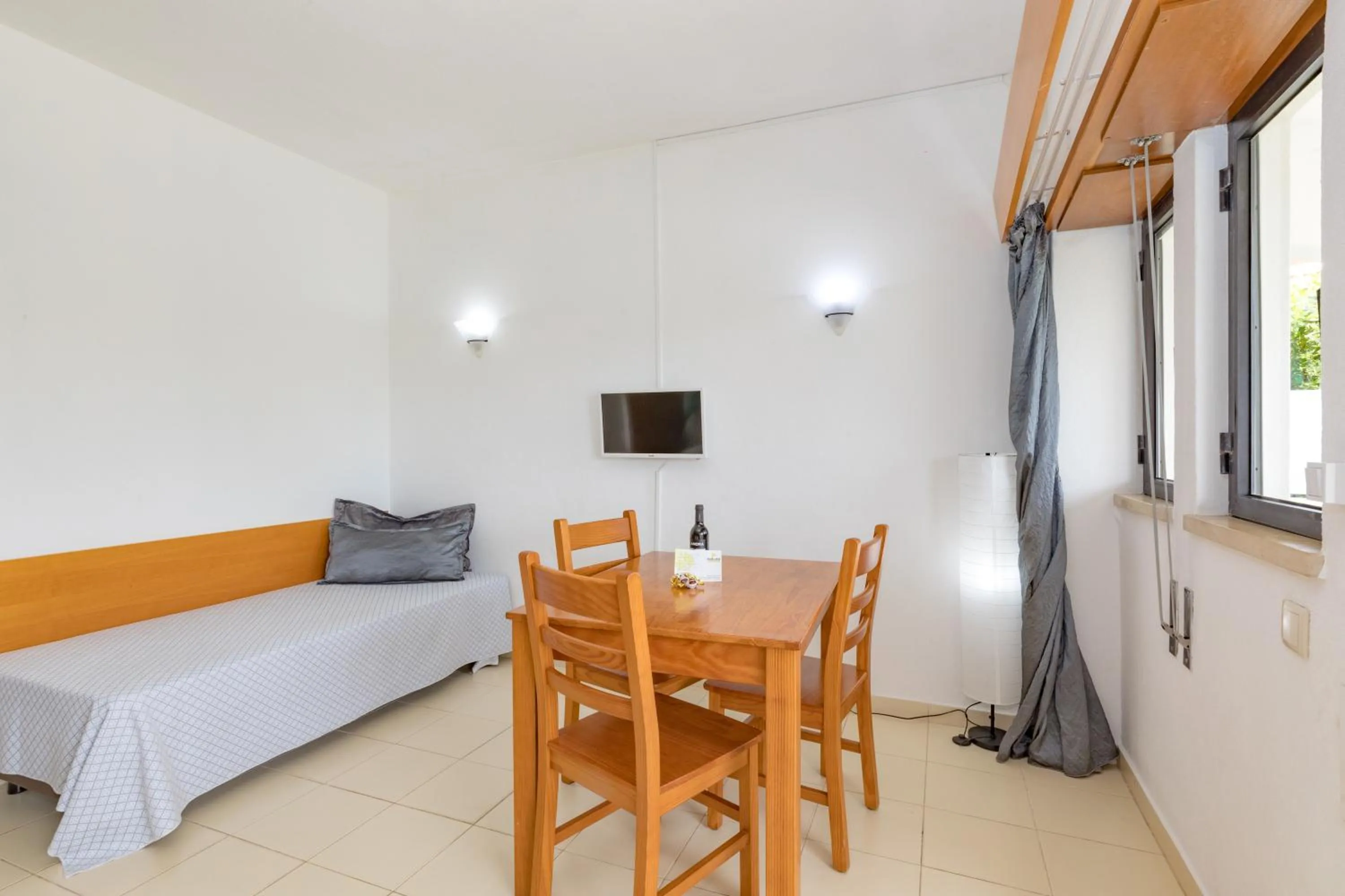 Seating area, Bed in Natura Algarve Club