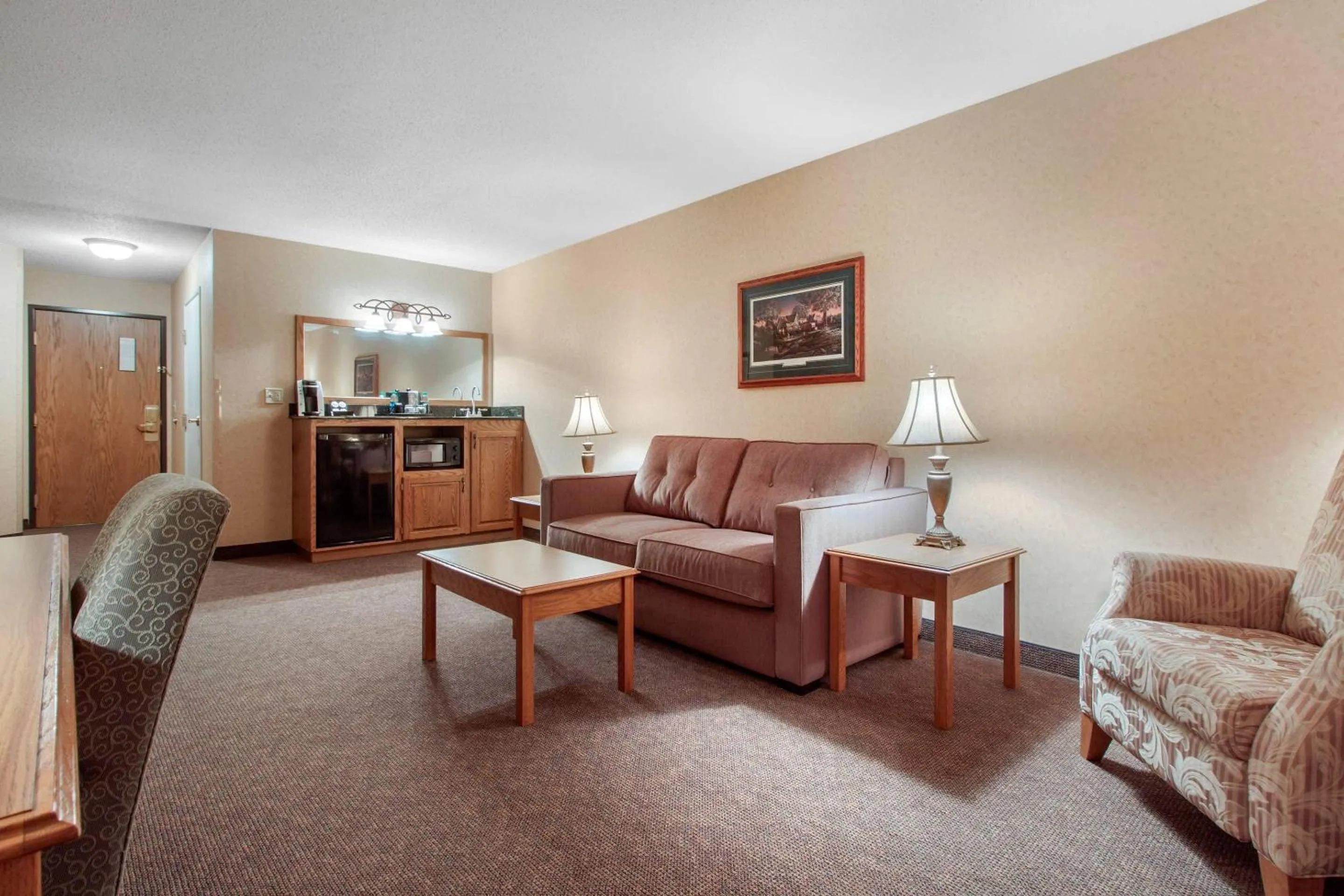 Bedroom in Norfolk Lodge & Suites, an Ascend Collection Hotel